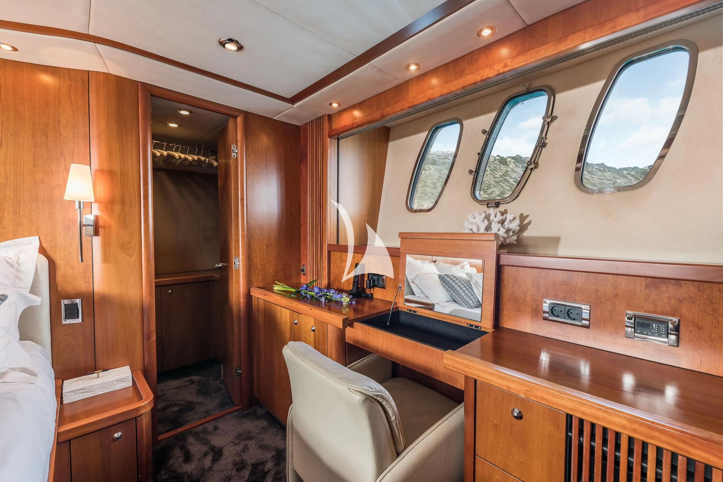 a room with a desk and a chair aboard FROGGY Yacht for Sale