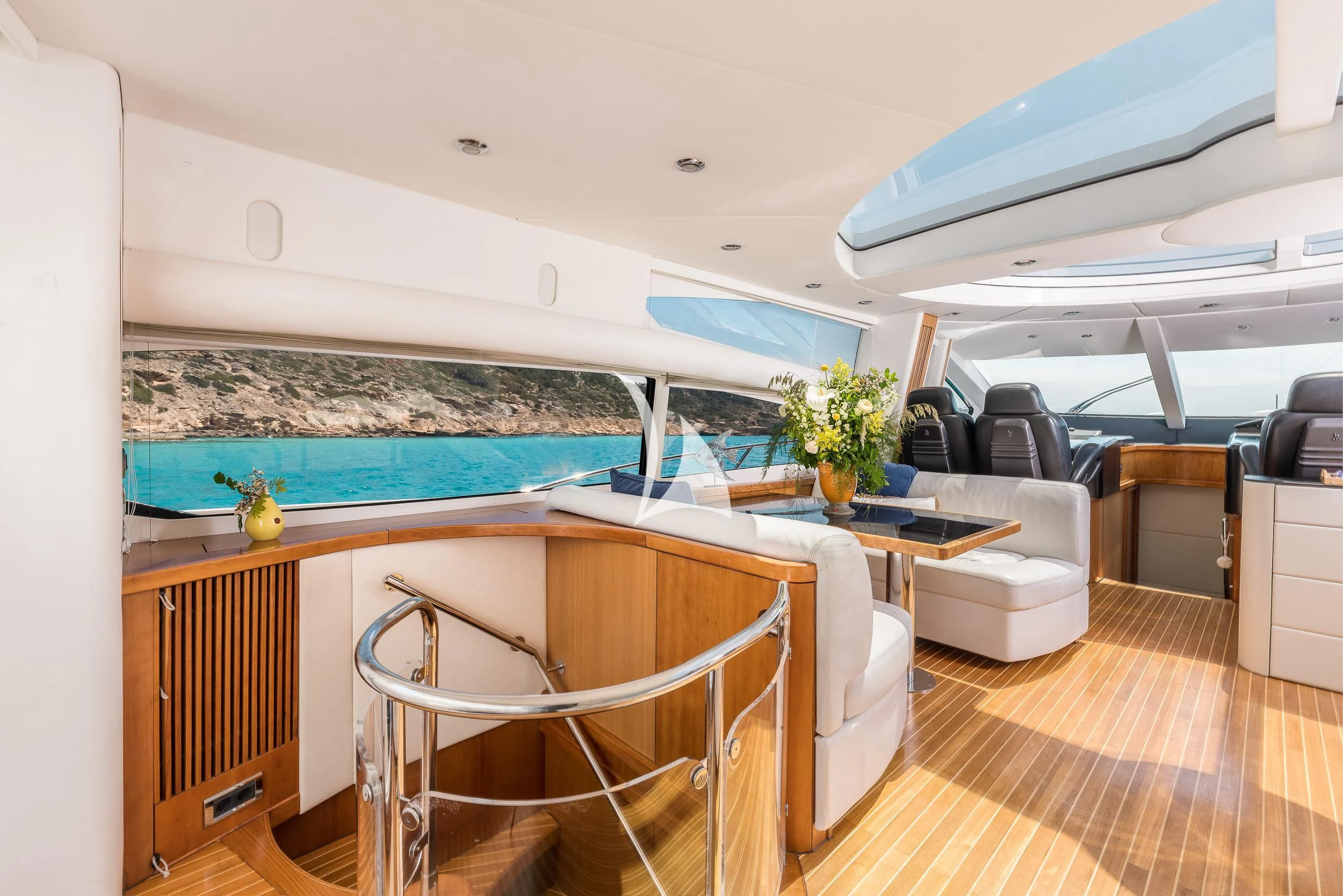 a room with a table and chairs aboard FROGGY Yacht for Sale