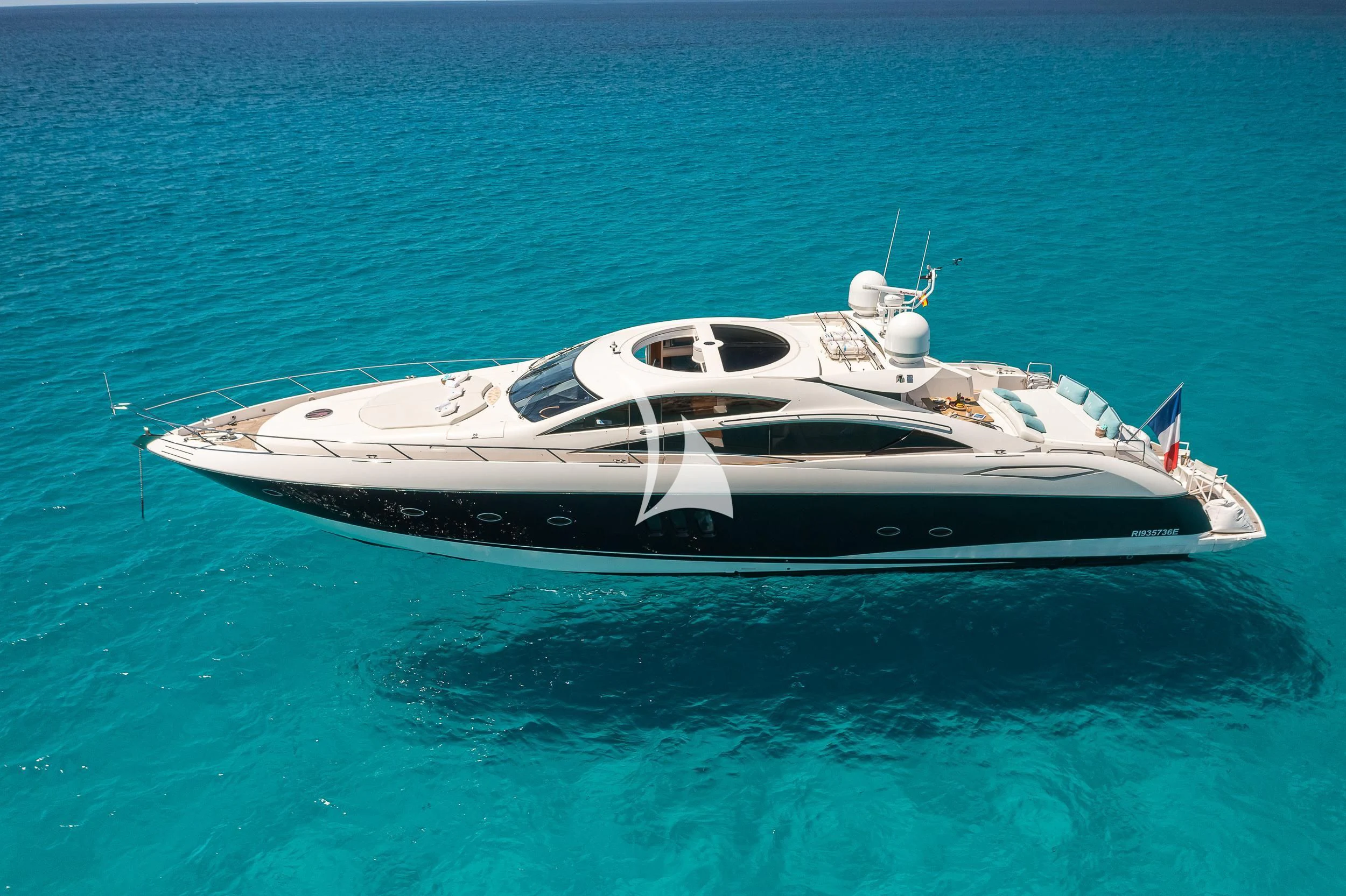 a white yacht in the water aboard FROGGY Yacht for Sale