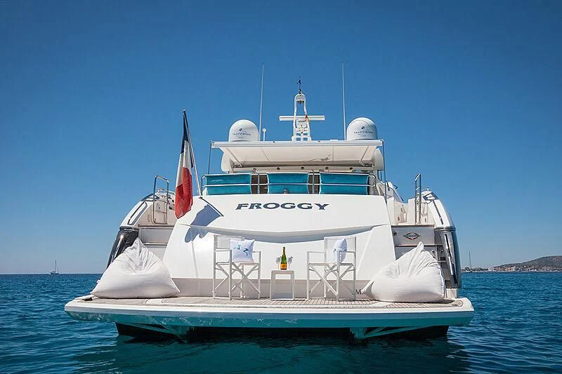 a white boat in the water aboard FROGGY Yacht for Sale