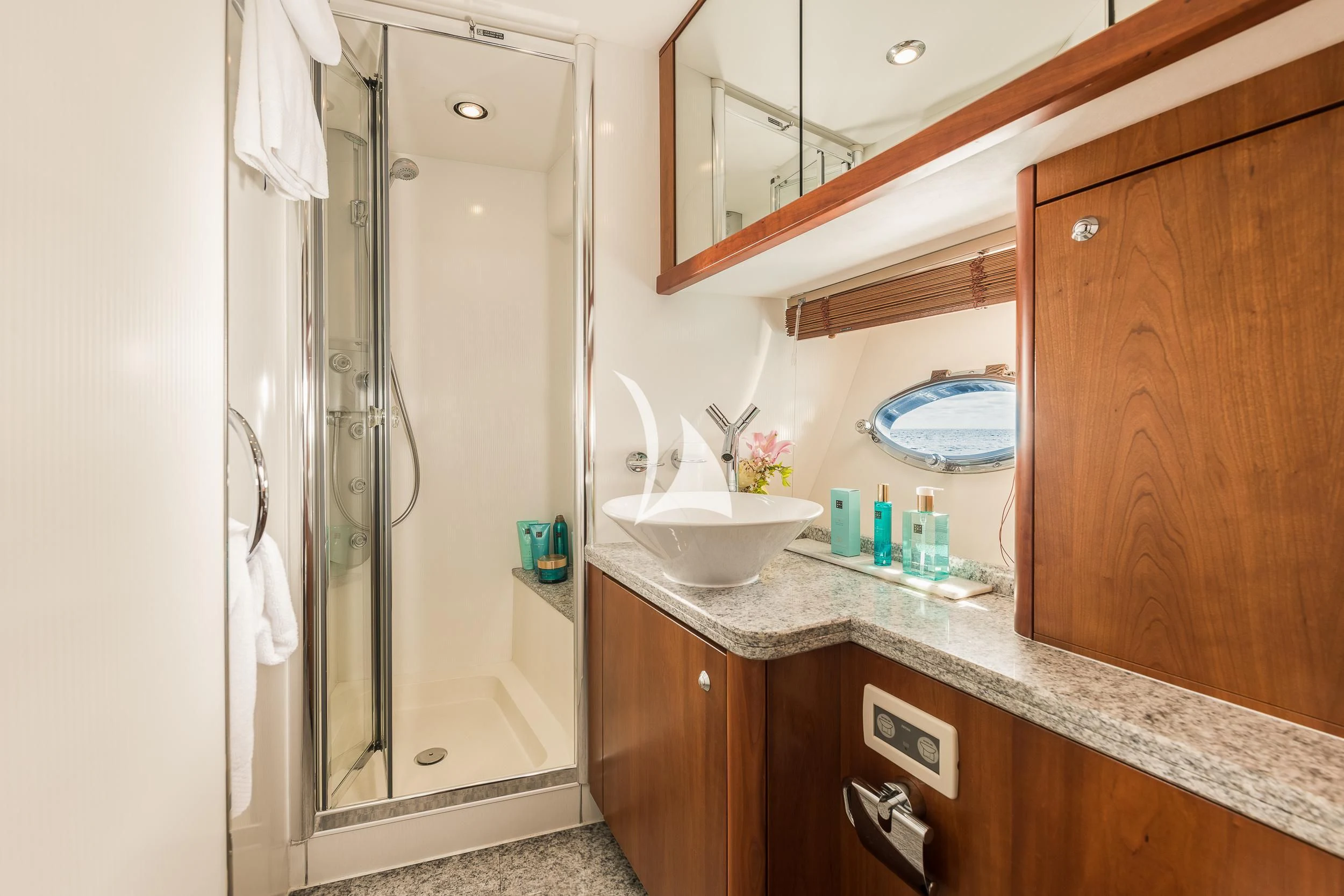 a bathroom with a sink and a shower aboard FROGGY Yacht for Sale