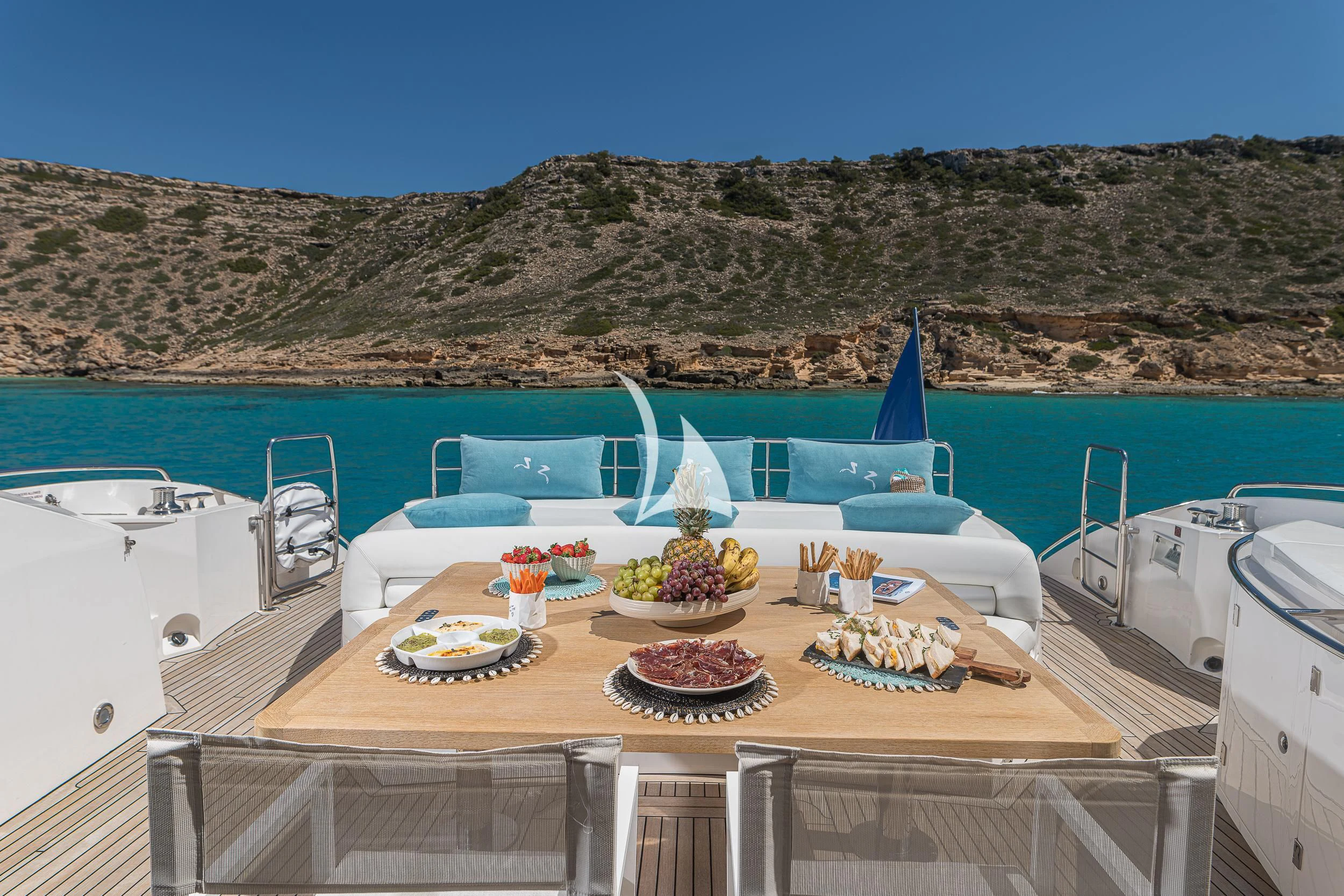 a table with food on it aboard FROGGY Yacht for Sale