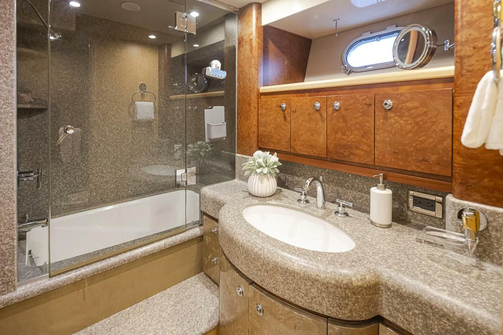 a bathroom with a large mirror aboard SEA SPUR Yacht for Sale