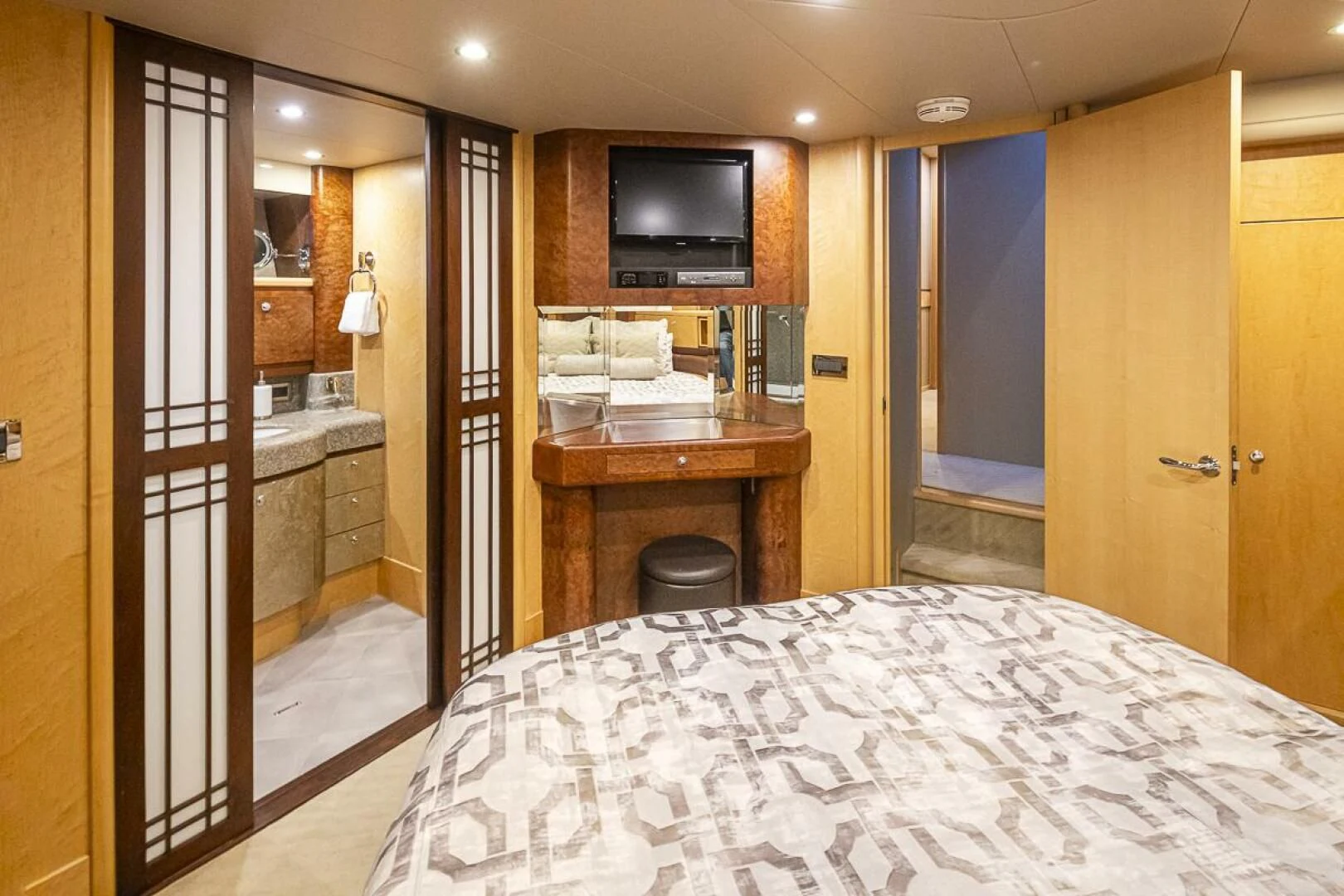 a bedroom with a bed aboard SEA SPUR Yacht for Sale