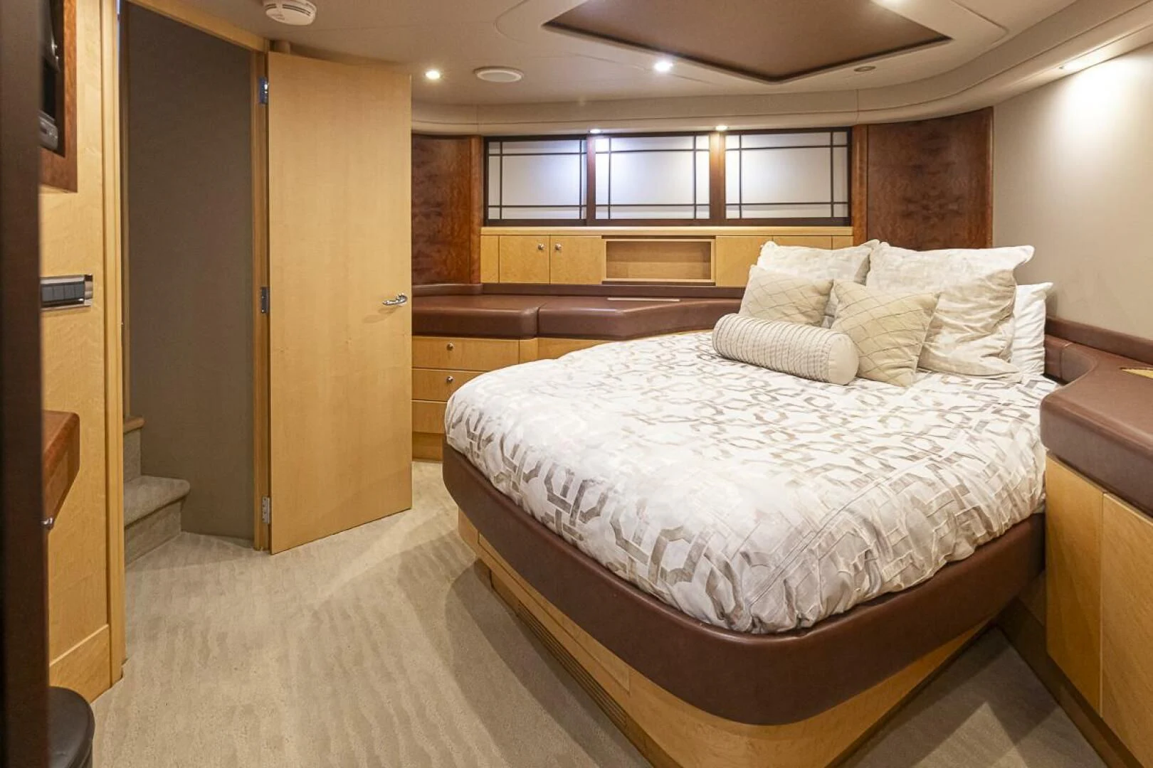 a large bedroom with a bed aboard SEA SPUR Yacht for Sale