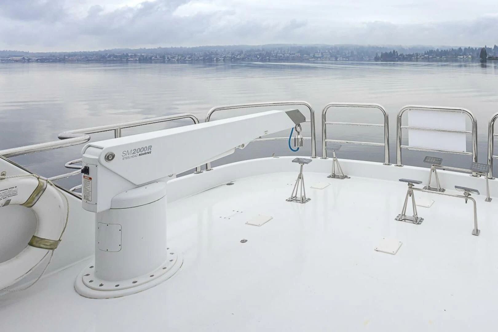 a white boat on a body of water aboard SEA SPUR Yacht for Sale