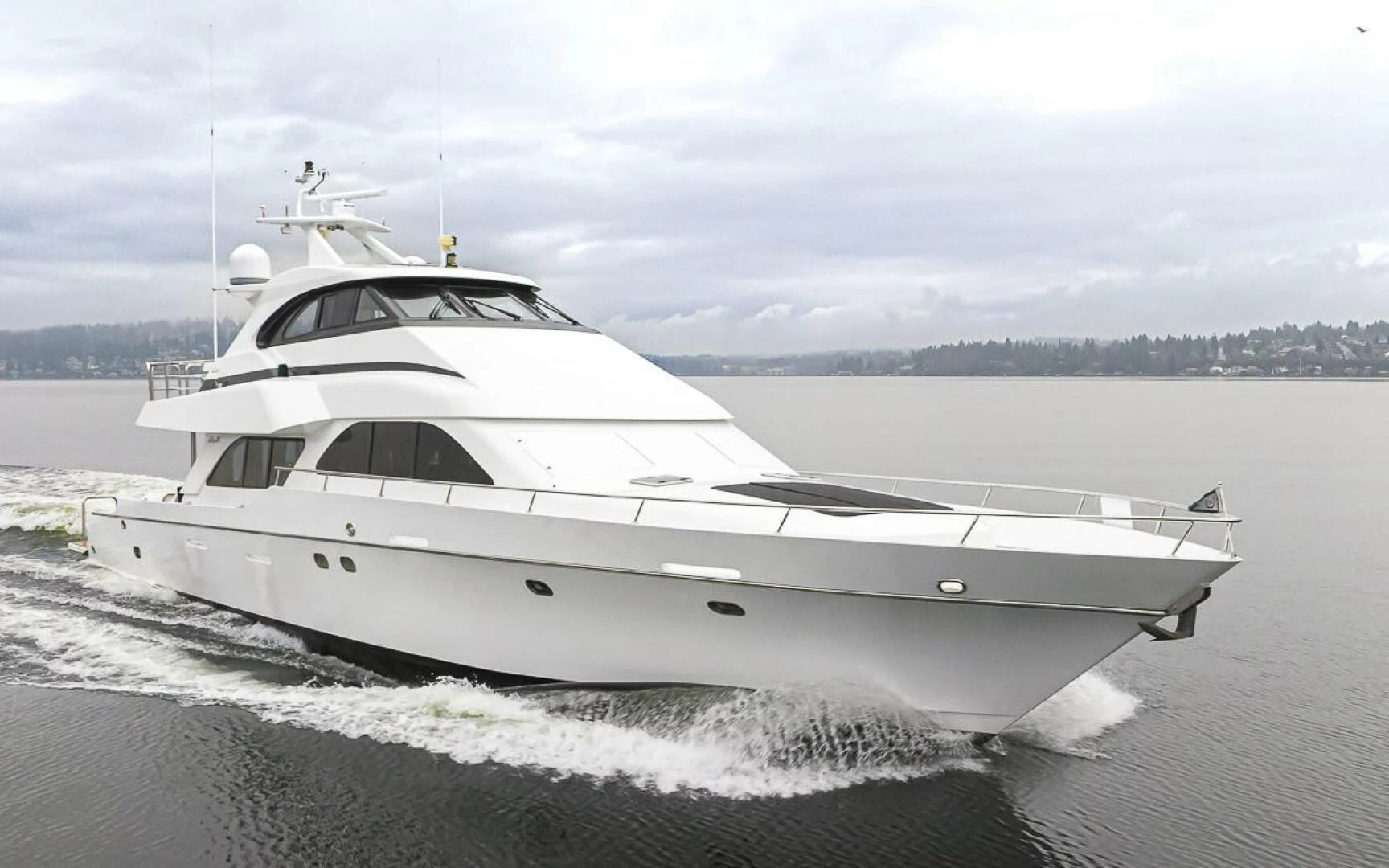 a white yacht on a beach aboard SEA SPUR Yacht for Sale