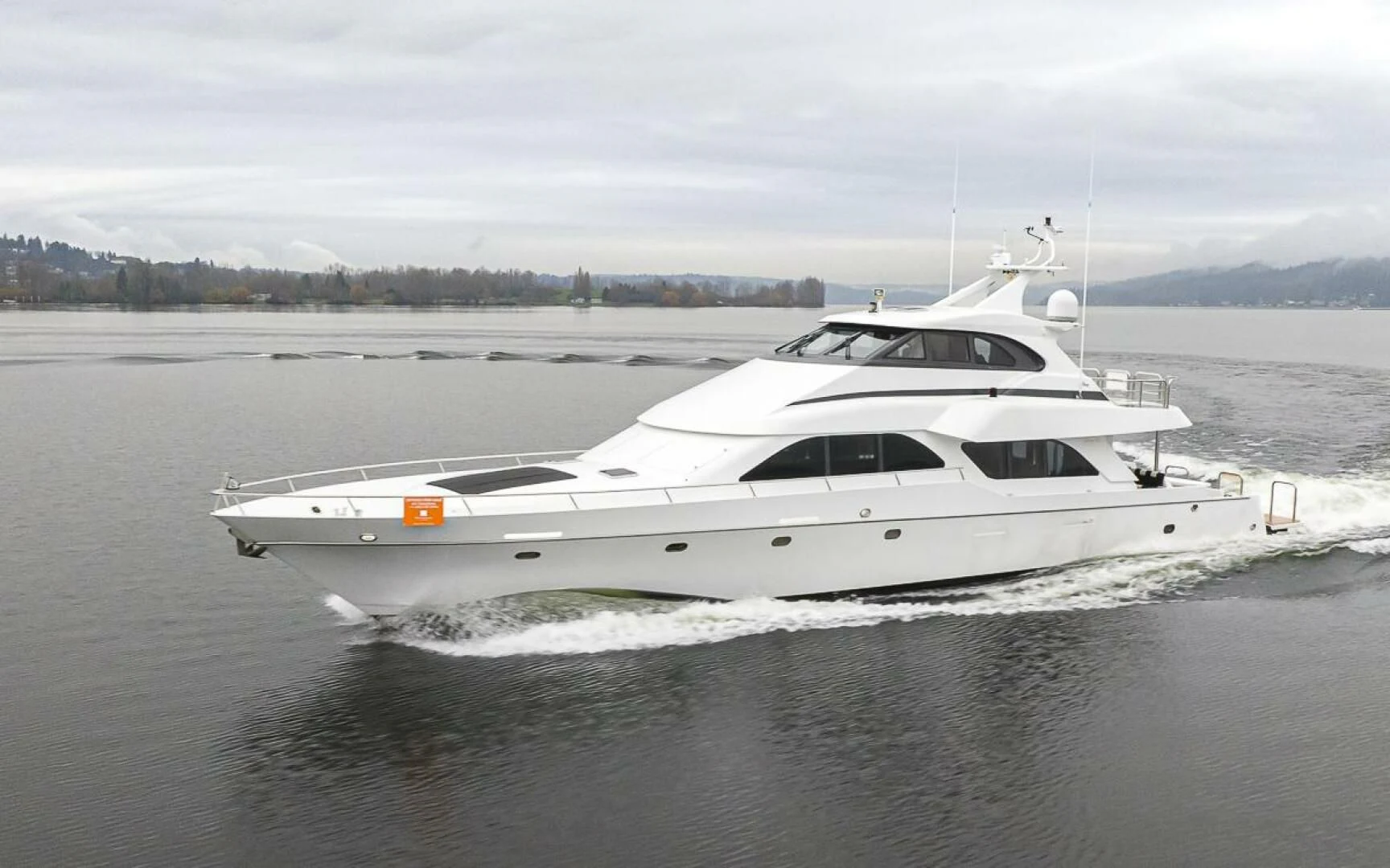 a white yacht in the water aboard SEA SPUR Yacht for Sale