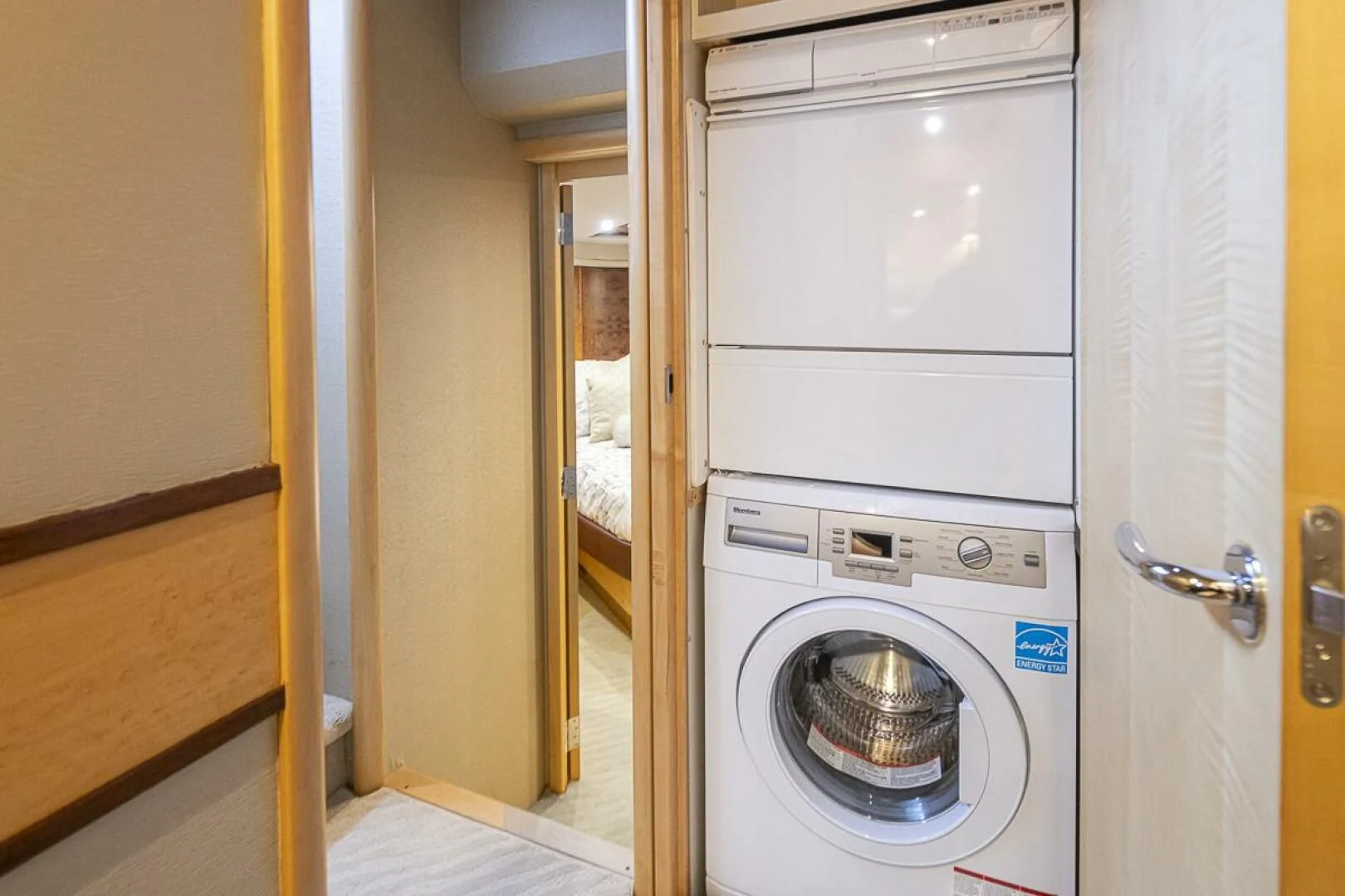 a washing machine in a room aboard SEA SPUR Yacht for Sale