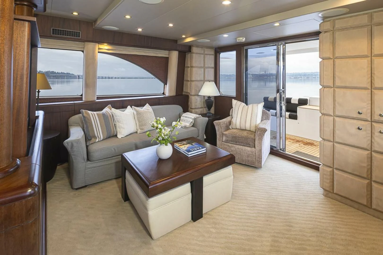 a living room with a couch and a coffee table aboard SEA SPUR Yacht for Sale