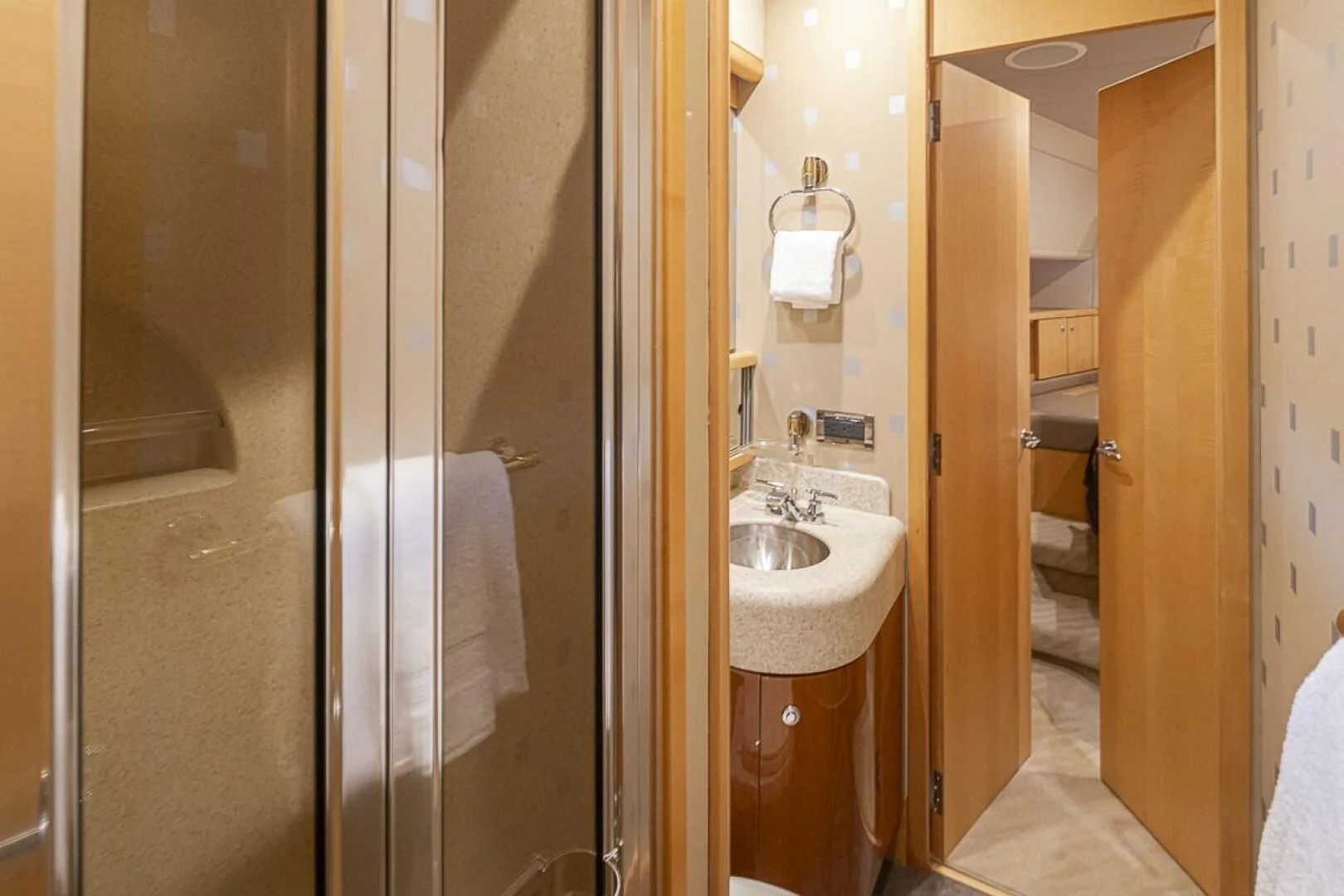 a bathroom with a sink and a mirror aboard SEA SPUR Yacht for Sale