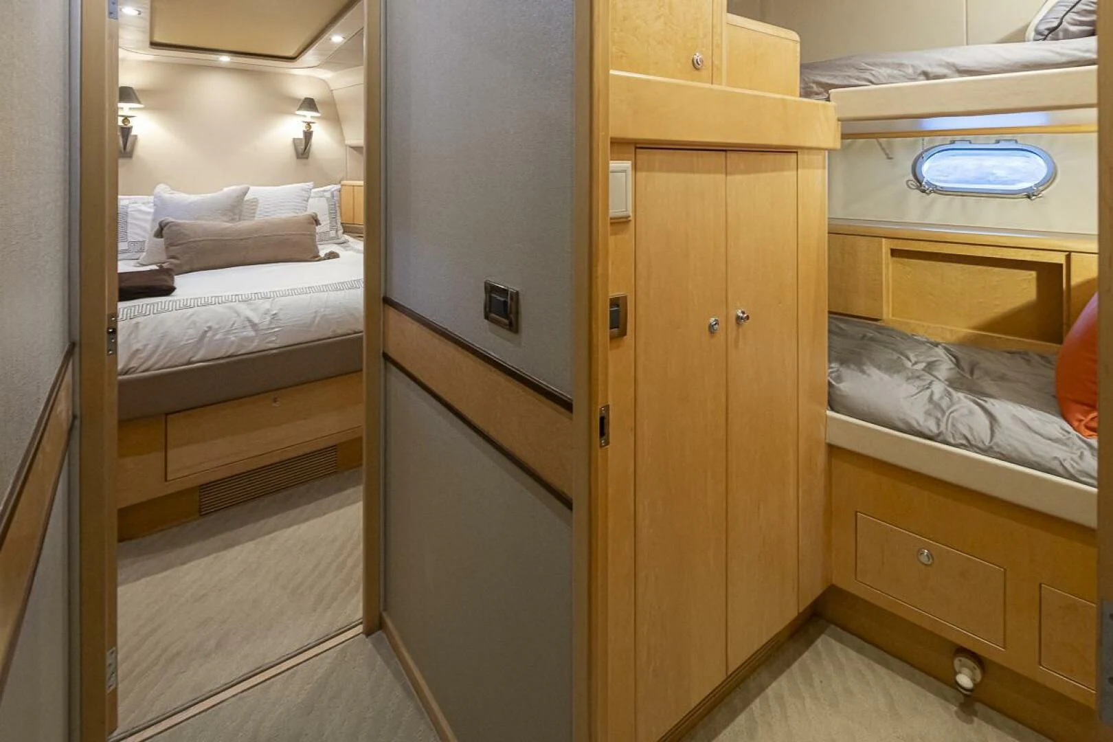 a room with a bed and a desk aboard SEA SPUR Yacht for Sale