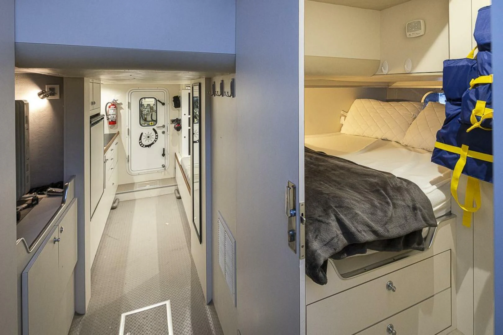 a hospital room with a bed and a closet aboard SEA SPUR Yacht for Sale