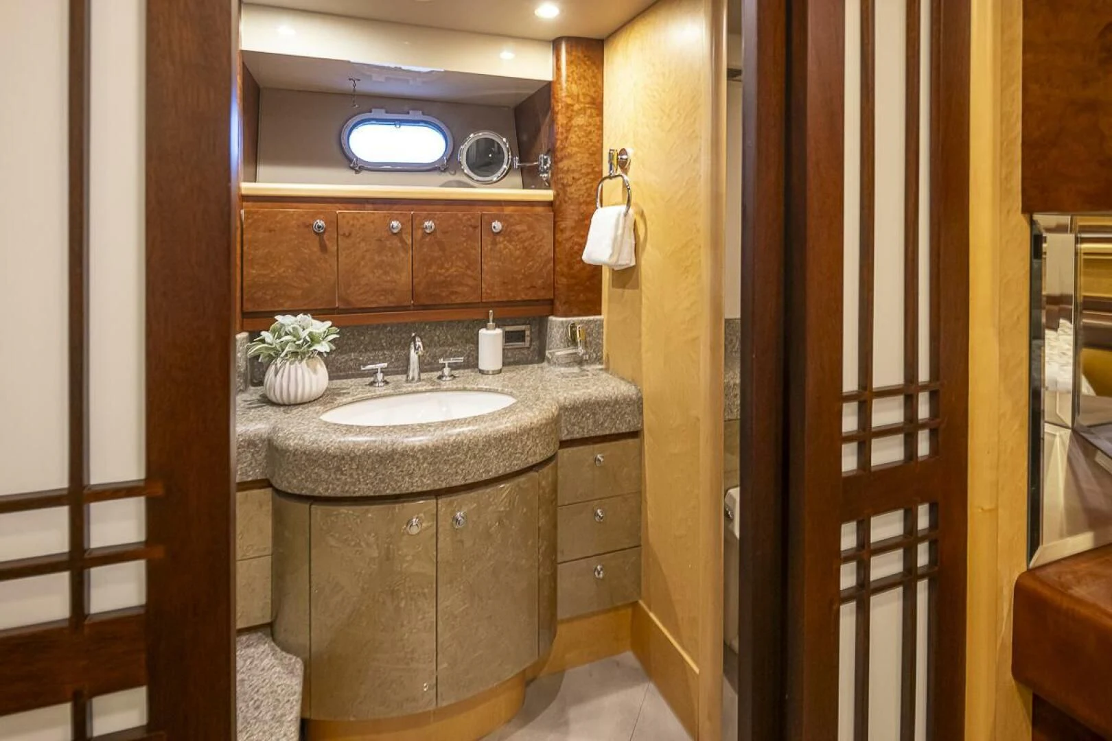 a bathroom with a sink and cabinets aboard SEA SPUR Yacht for Sale