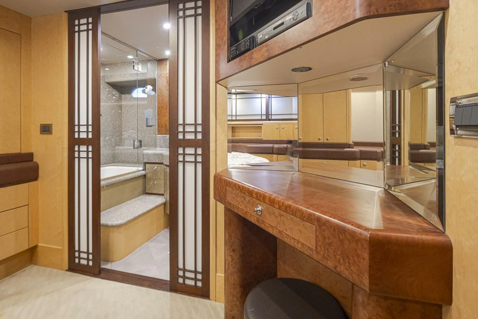 a bathroom with a countertop sink and a mirror aboard SEA SPUR Yacht for Sale