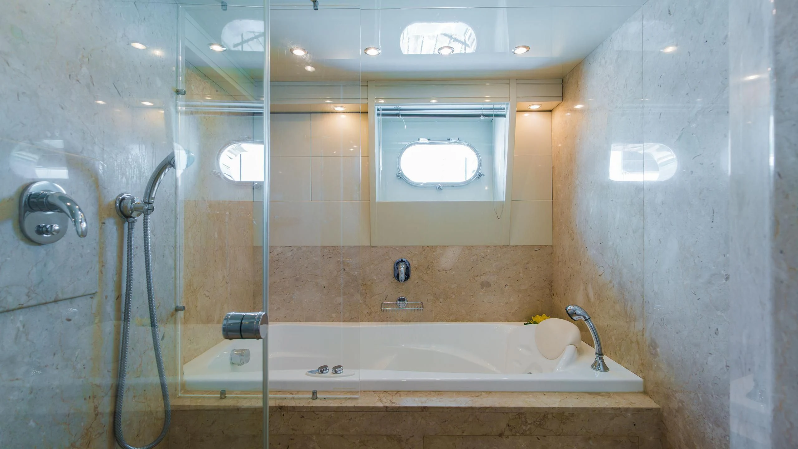a bathroom with a tub aboard AVELINE Yacht for Sale