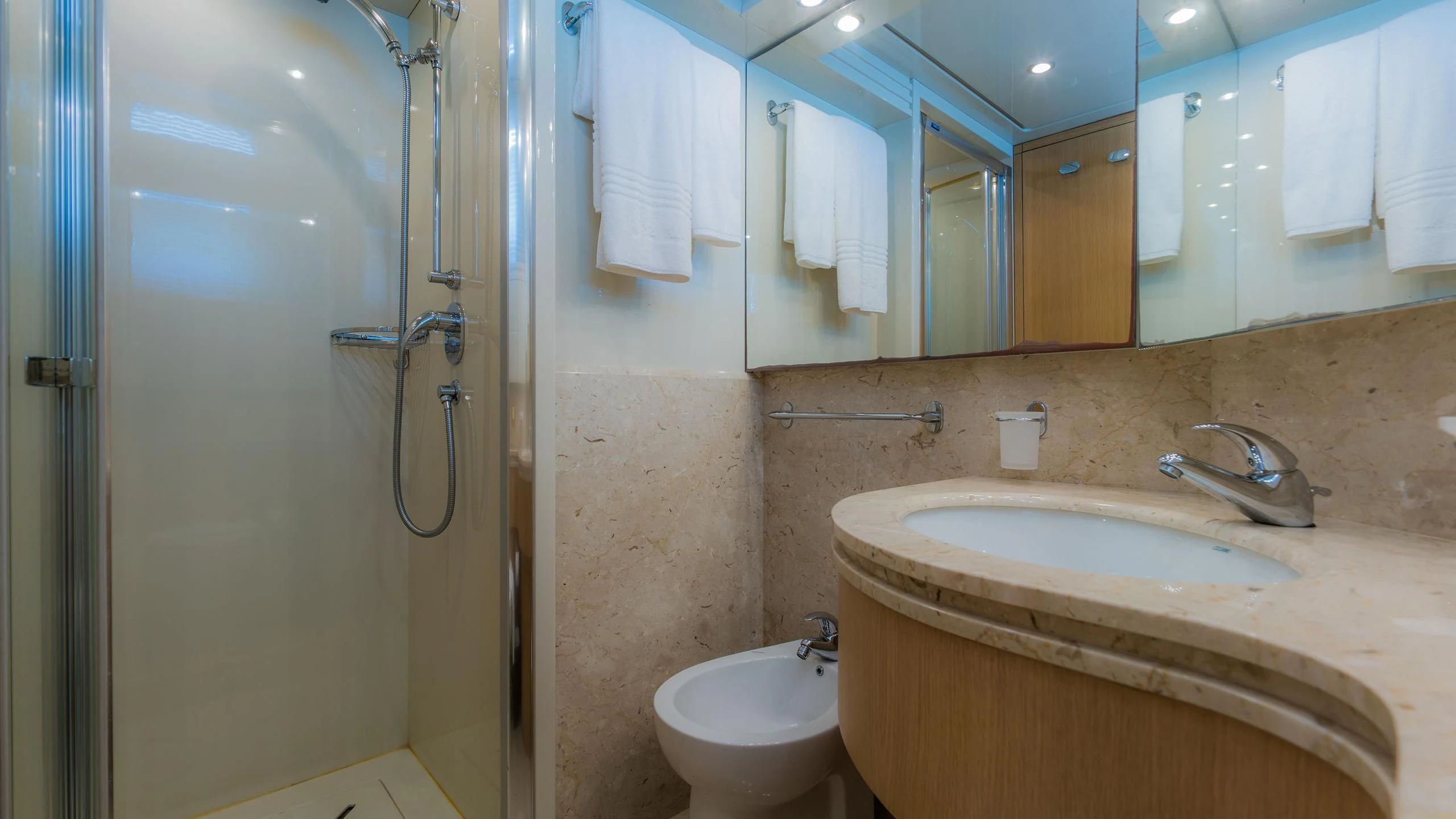 a bathroom with a sink and a toilet aboard AVELINE Yacht for Sale