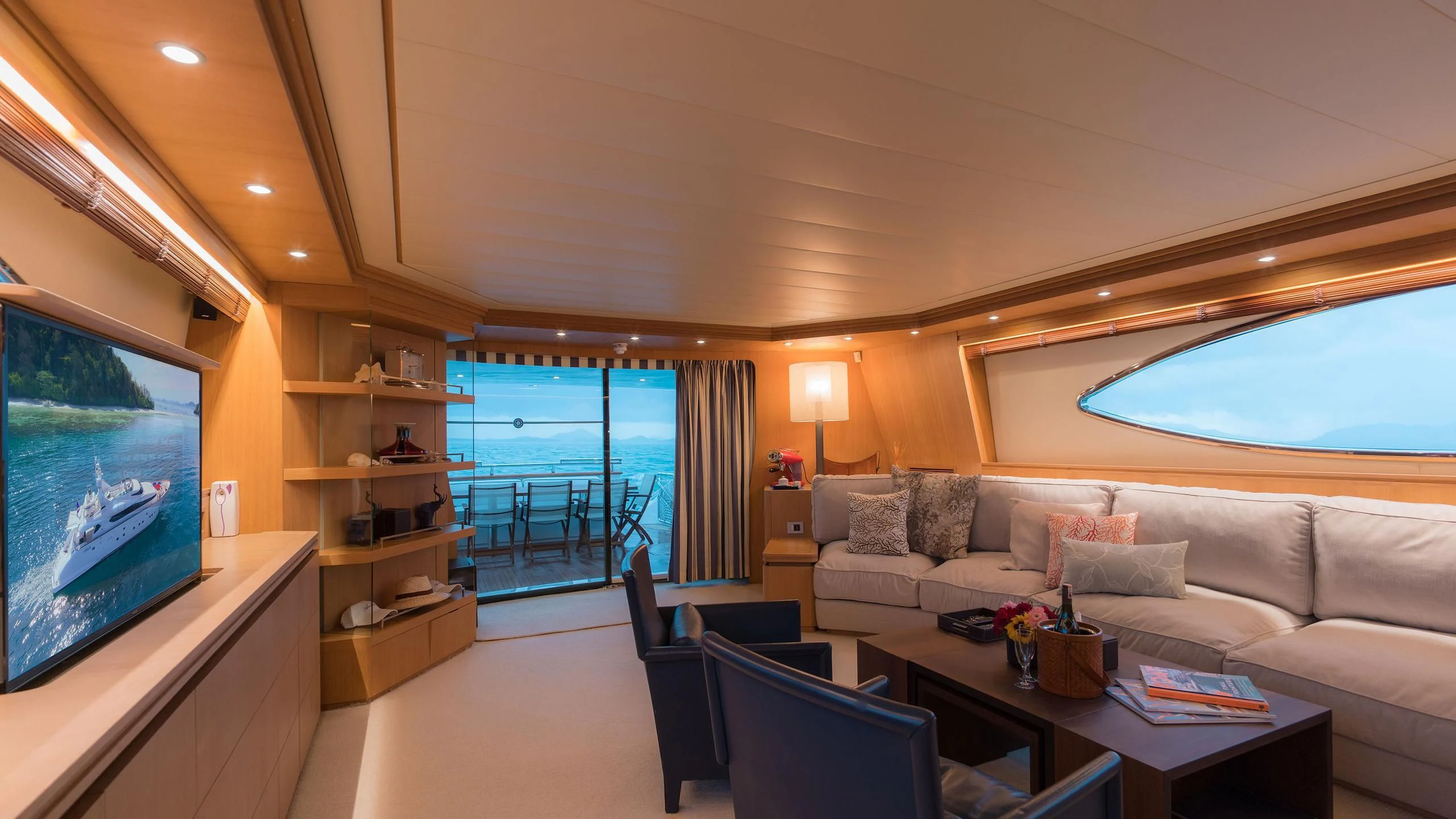 a living room with a large window aboard AVELINE Yacht for Sale