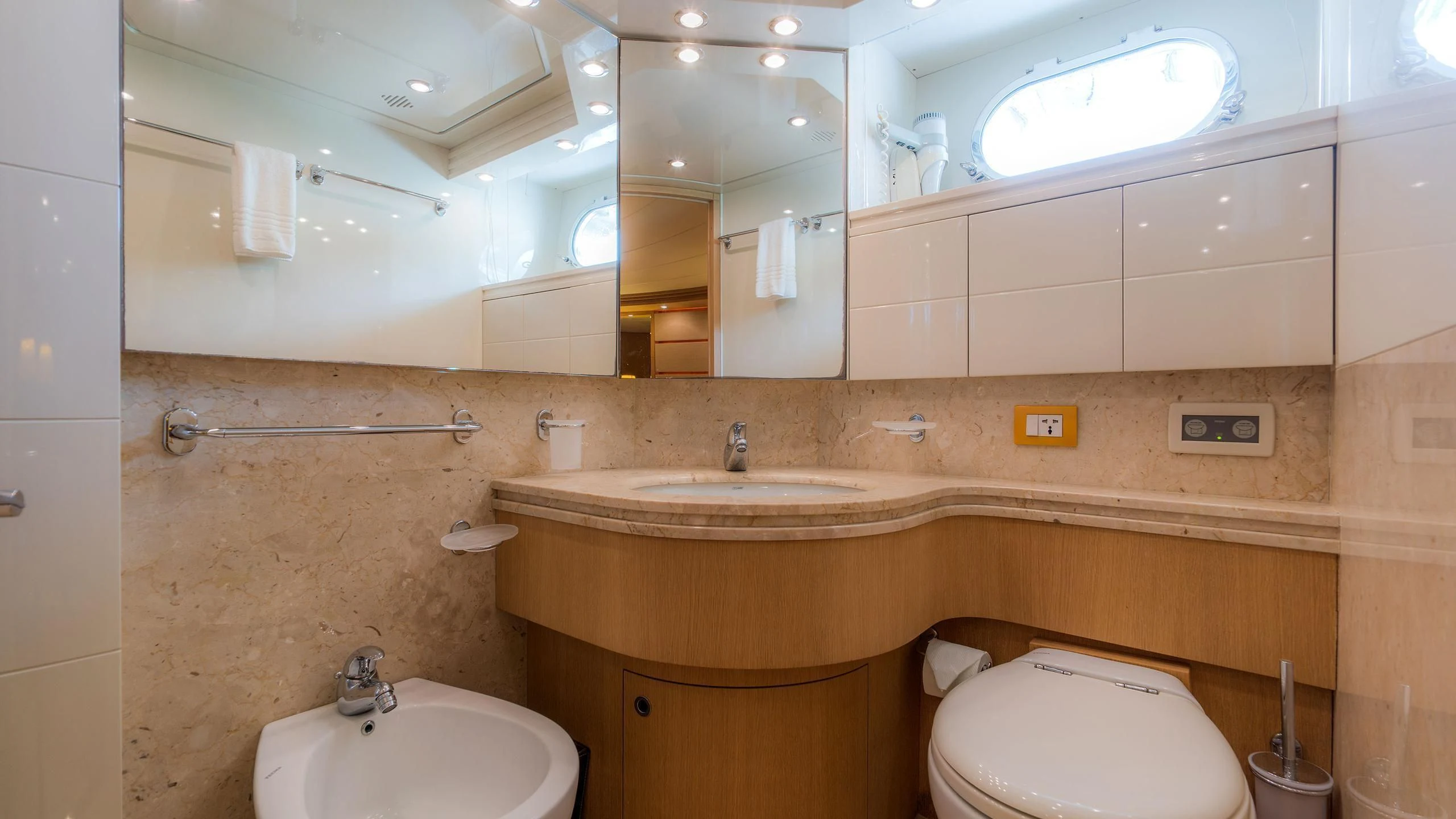 a bathroom with a sink and a toilet aboard AVELINE Yacht for Sale