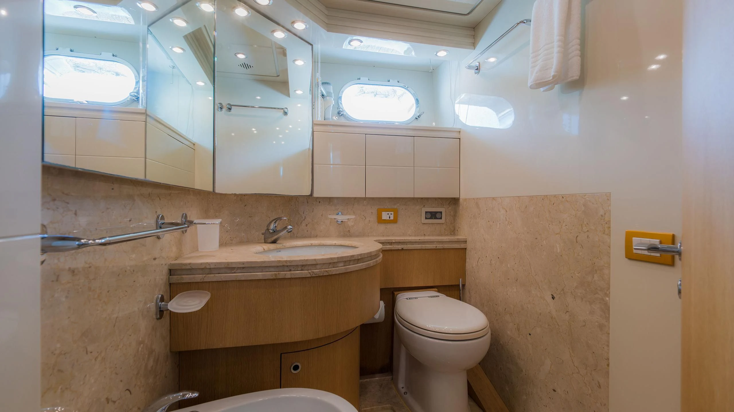 a bathroom with a sink and toilet aboard AVELINE Yacht for Sale