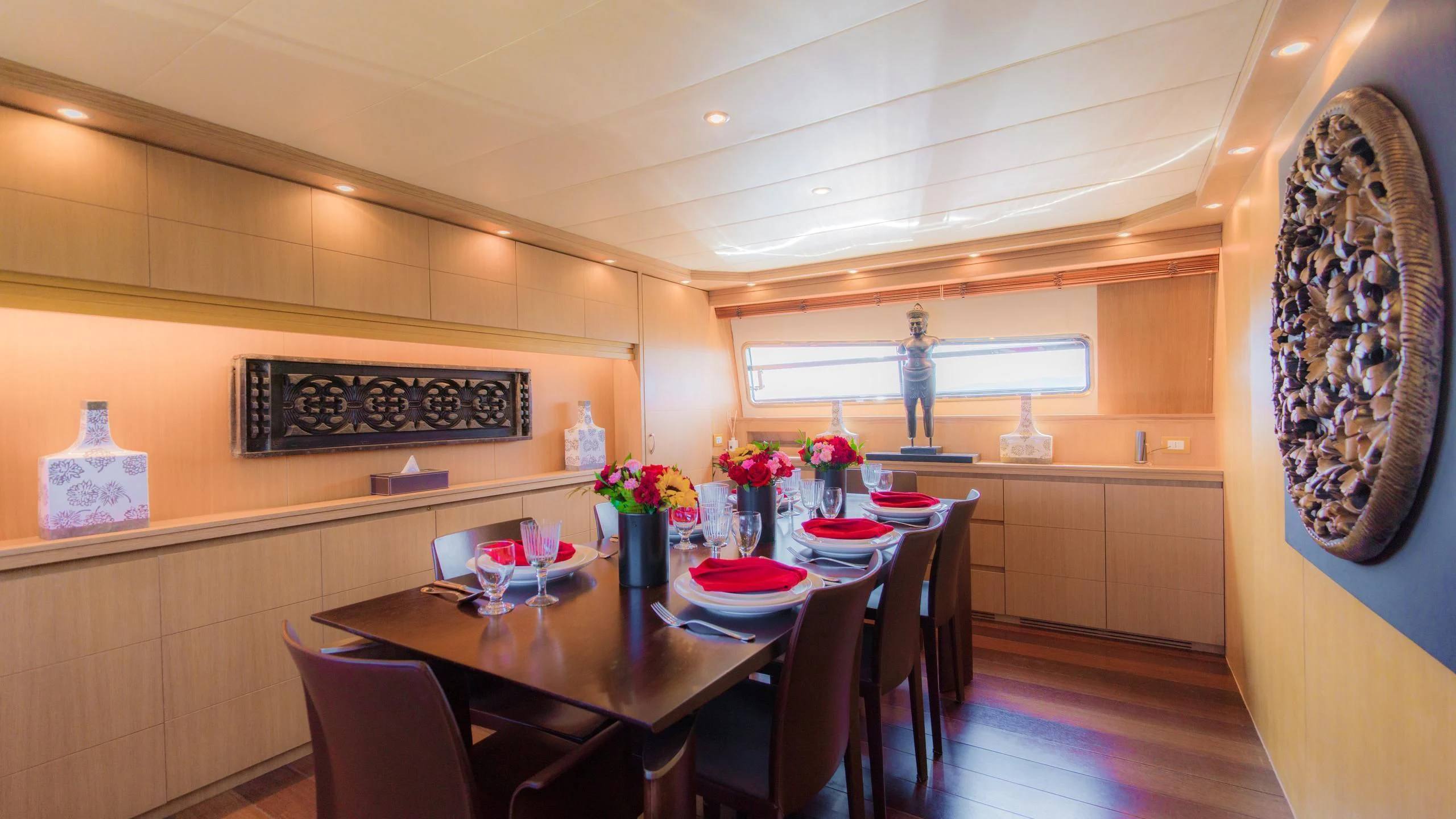 a dining room with a table and chairs aboard AVELINE Yacht for Sale