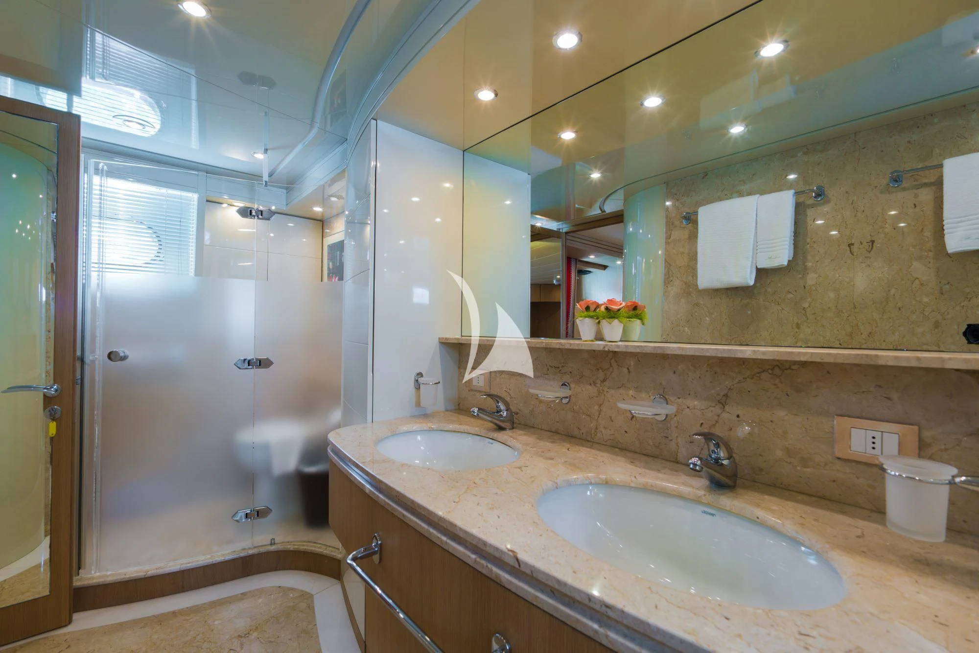 a bathroom with two sinks aboard AVELINE Yacht for Sale