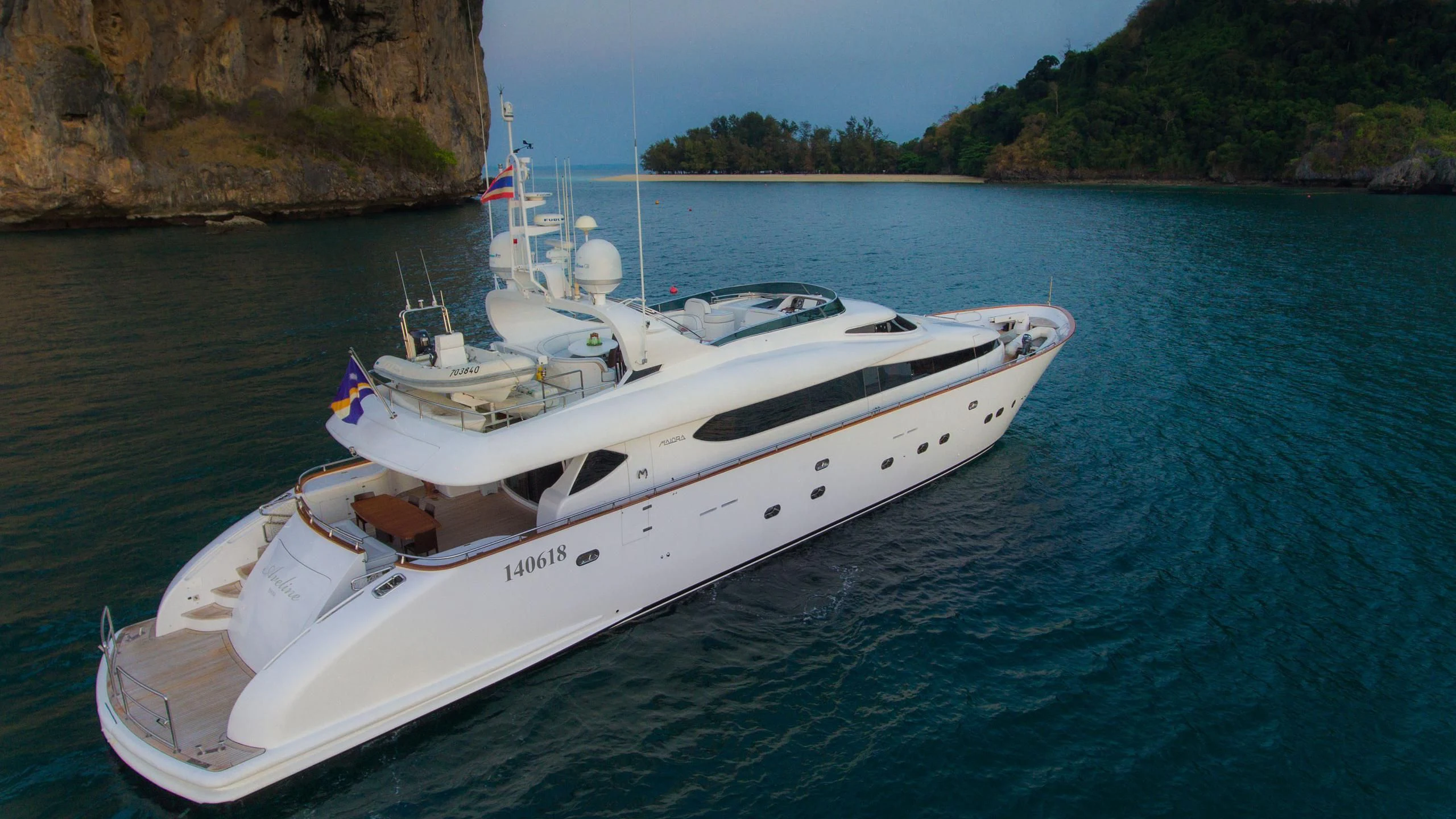 a white boat on the water aboard AVELINE Yacht for Sale