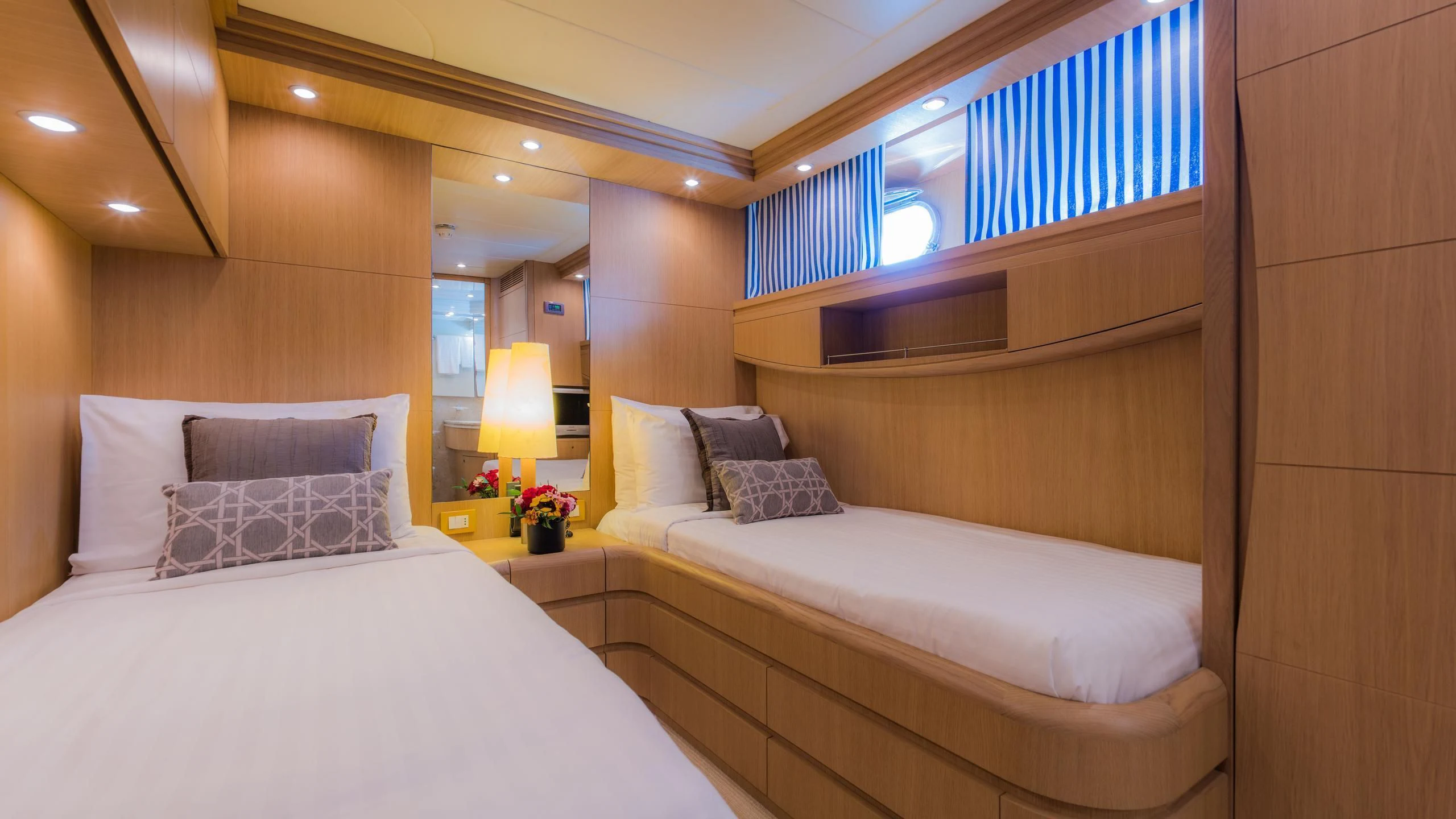 a room with two beds aboard AVELINE Yacht for Sale