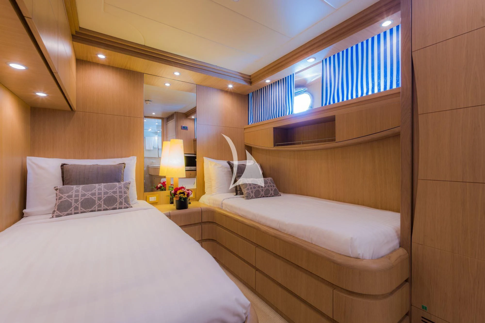 a room with two beds aboard AVELINE Yacht for Sale