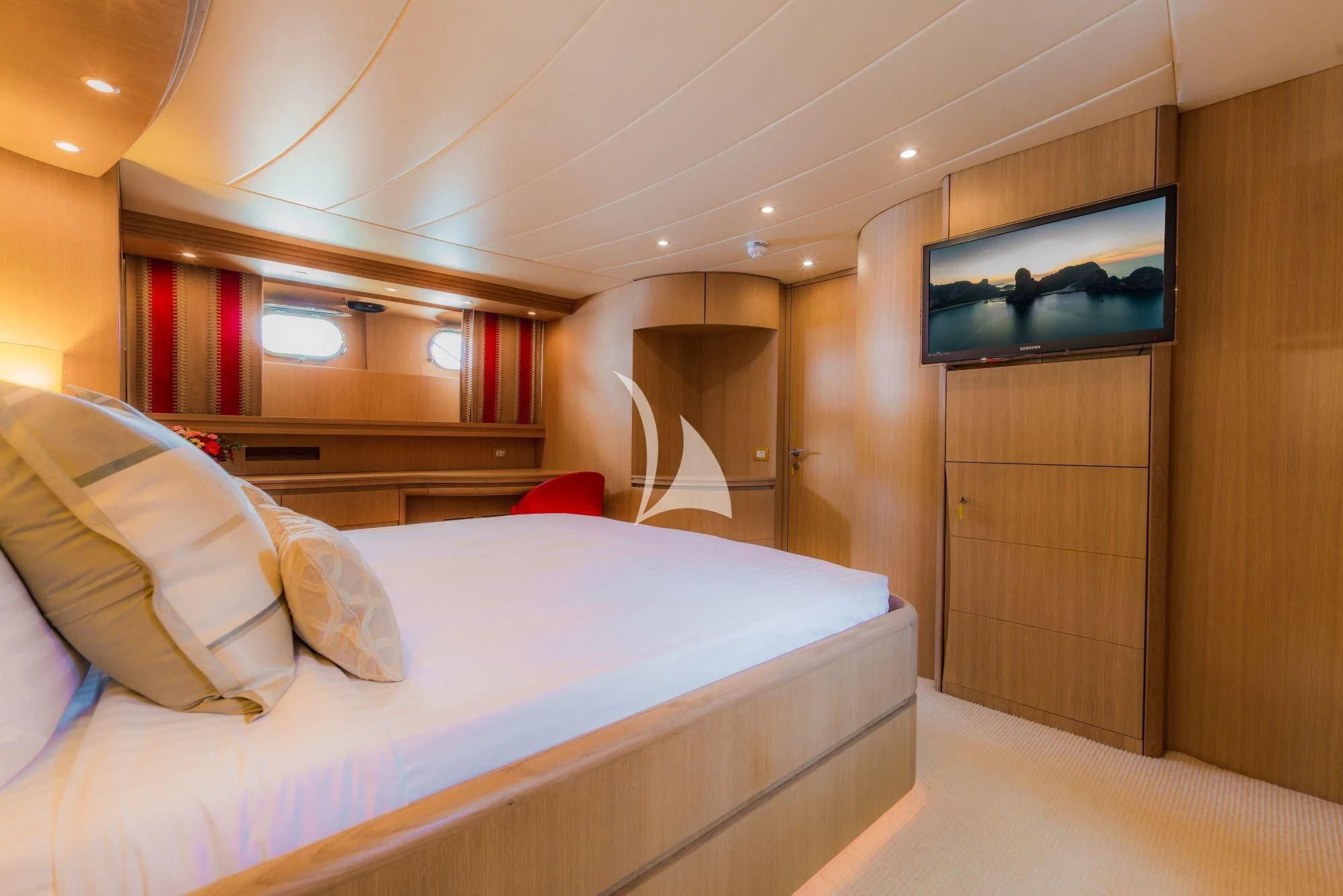 a room with a bed and a television aboard AVELINE Yacht for Sale