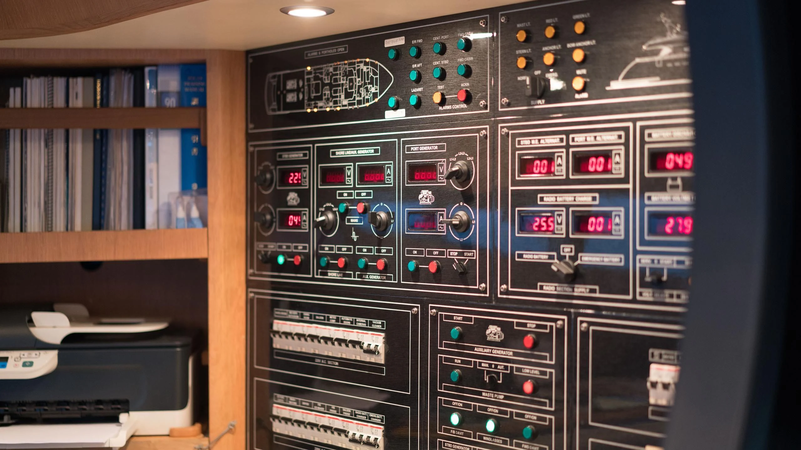 a computer tower with many screens aboard AVELINE Yacht for Sale