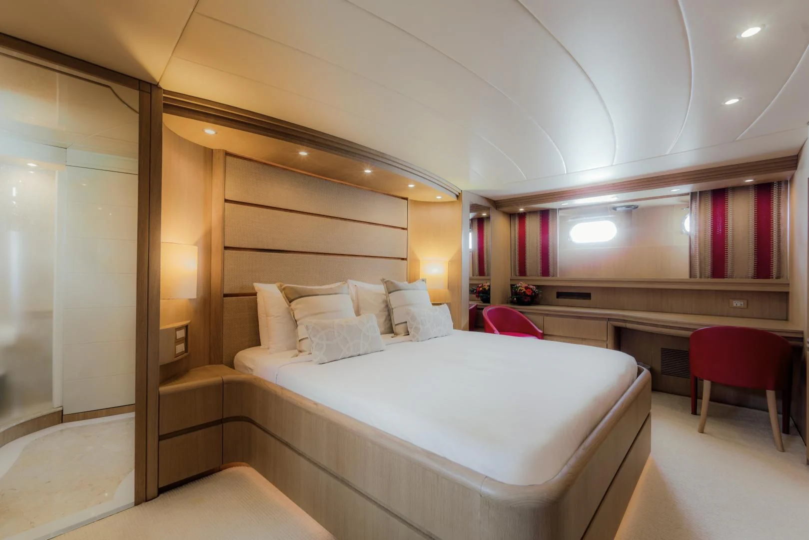a room with a bed and a desk aboard AVELINE Yacht for Sale
