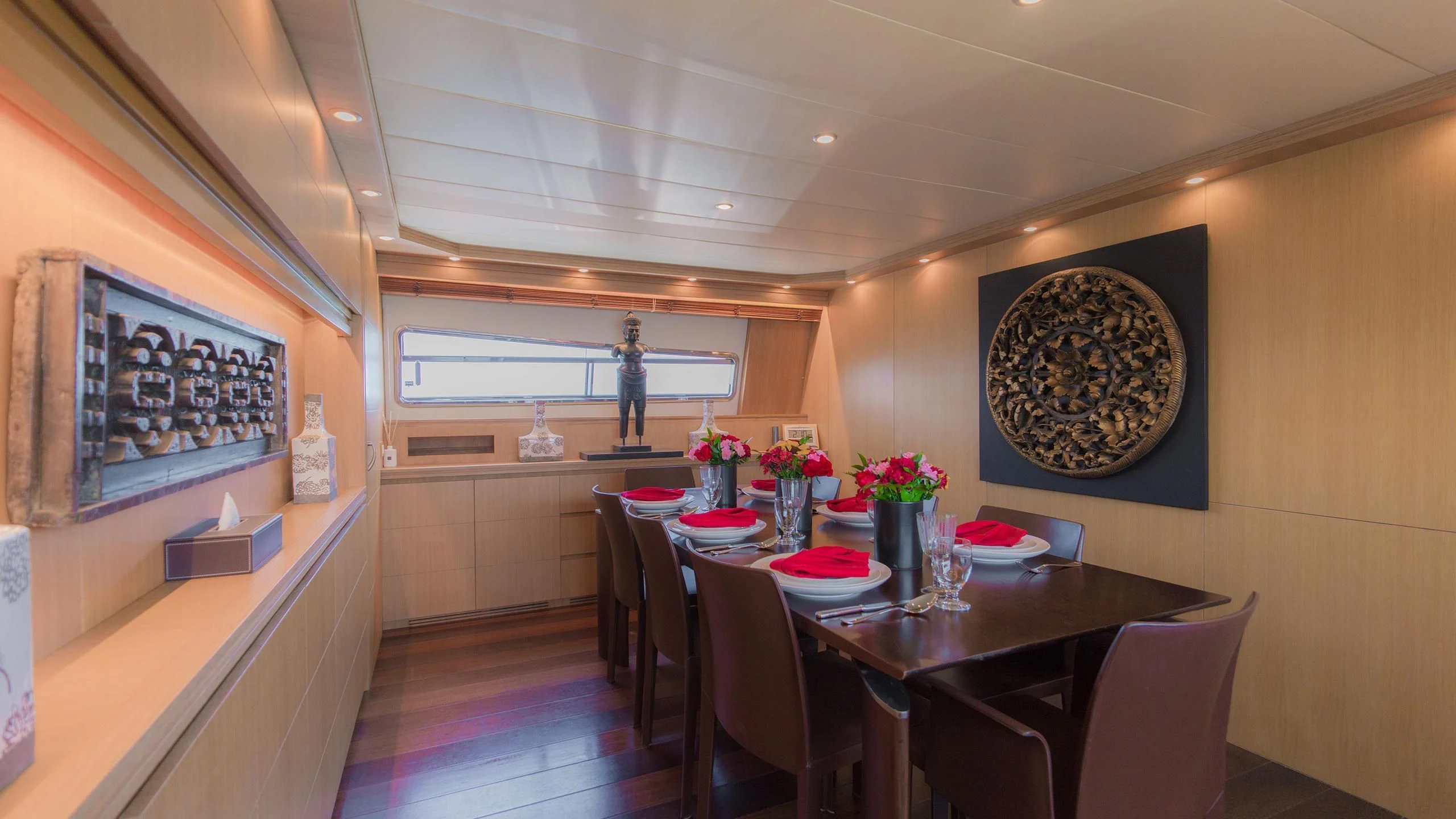 a dining room with a table and chairs aboard AVELINE Yacht for Sale