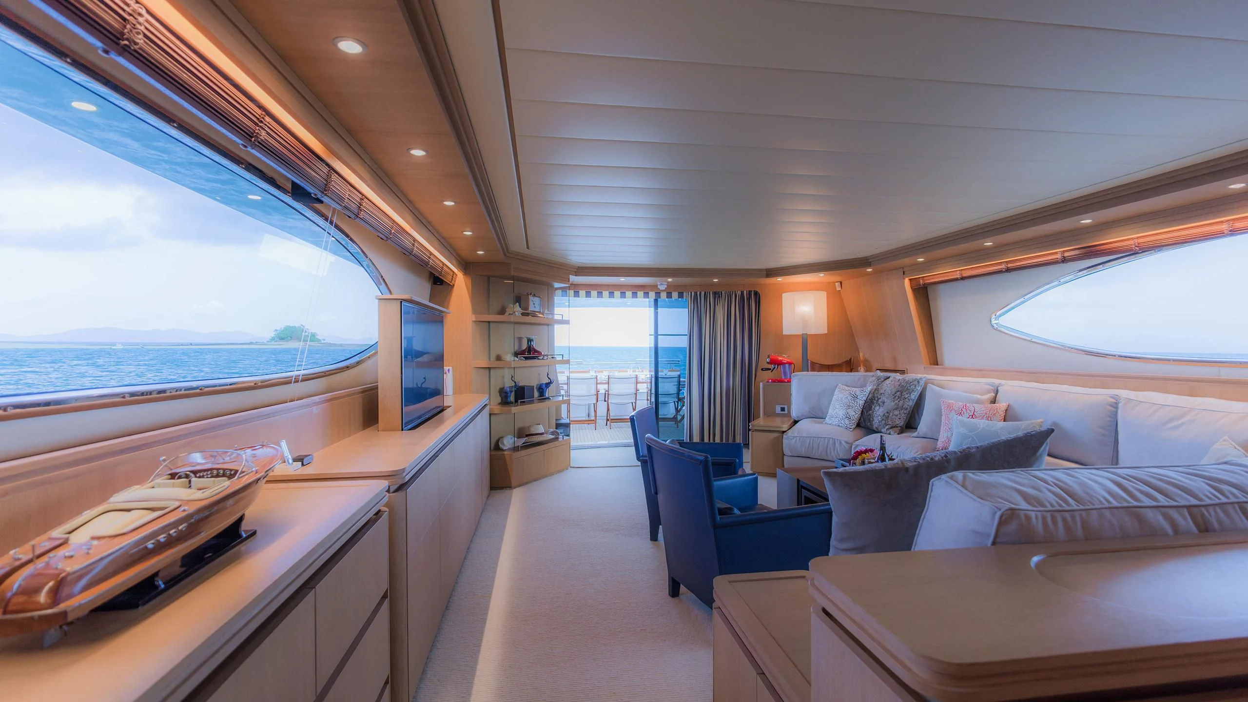 a room with a bed and a desk aboard AVELINE Yacht for Sale