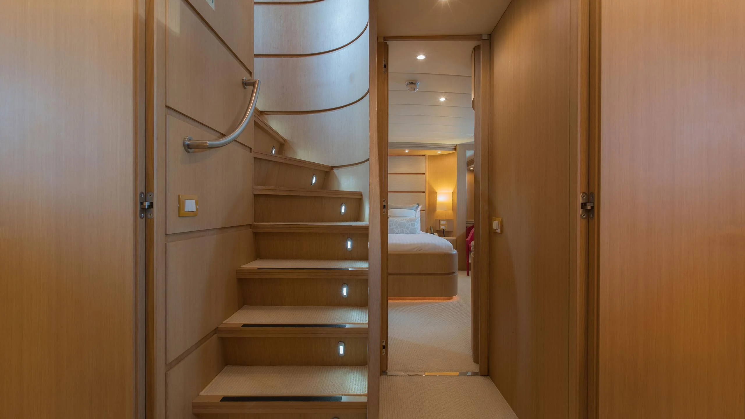 a set of stairs leading to a room aboard AVELINE Yacht for Sale