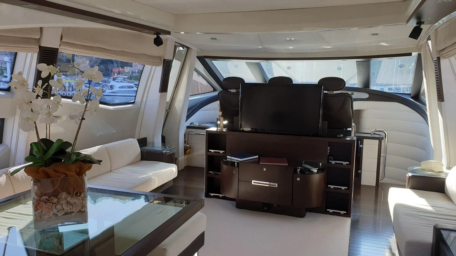a room with a piano and a couch aboard MR LEO Yacht for Sale