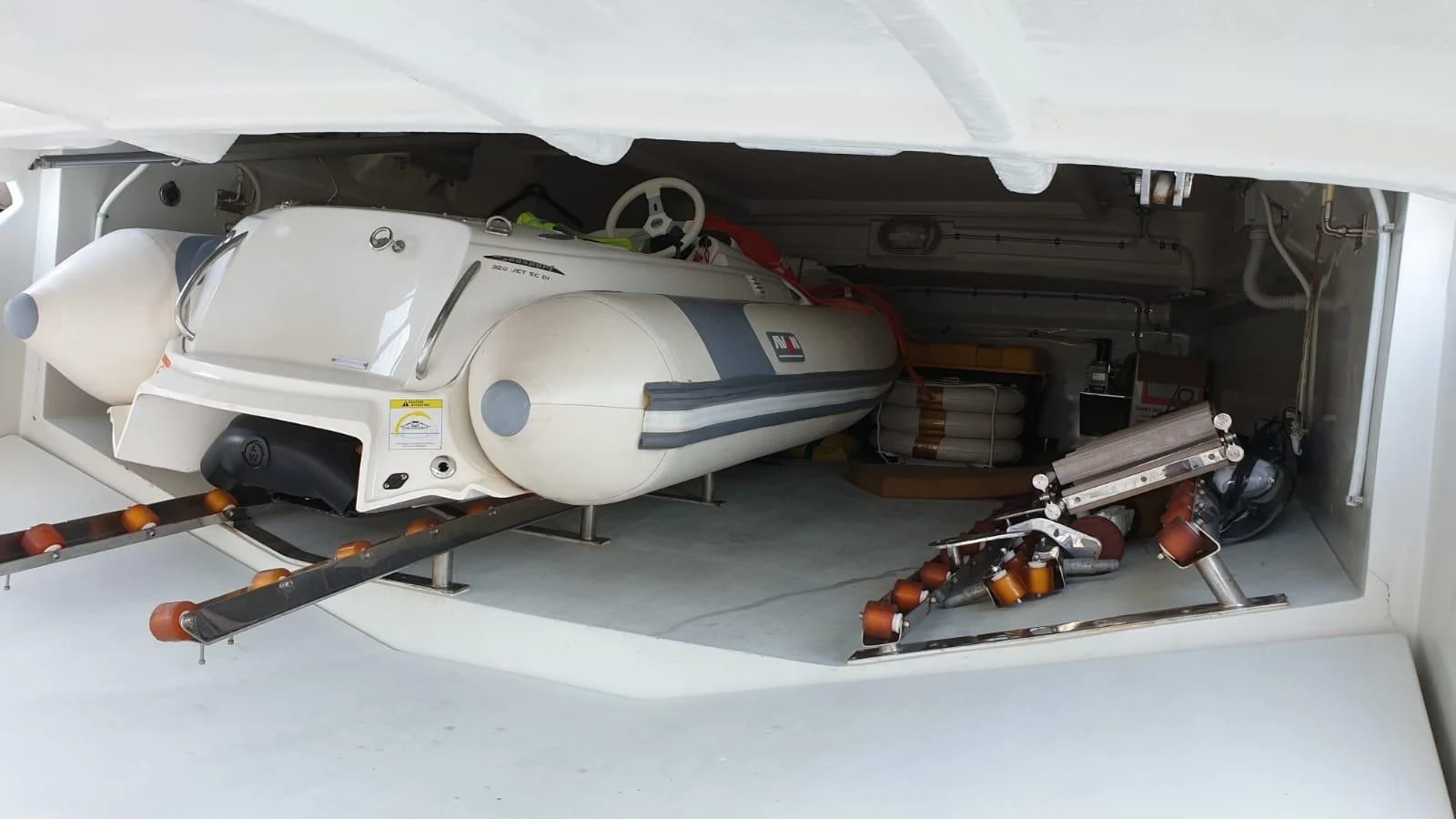 a white machine with a black handle aboard MR LEO Yacht for Sale