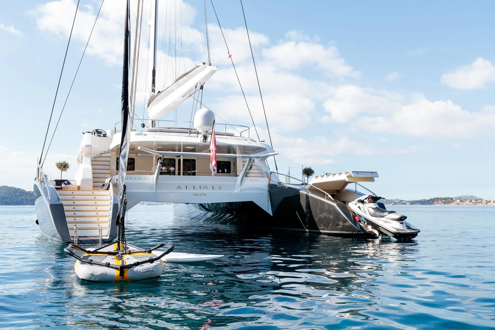 a boat on the water aboard ALLURES Yacht for Charter