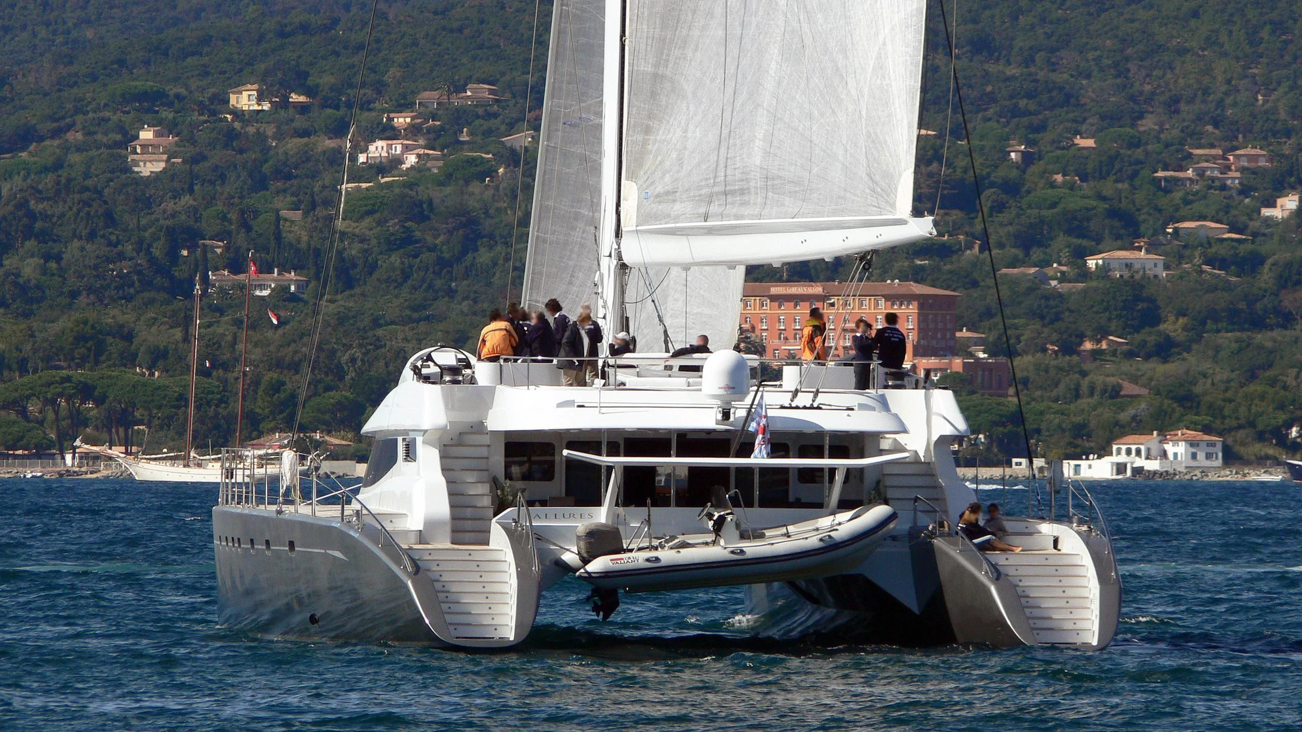 a group of people on a boat aboard ALLURES Yacht for Charter