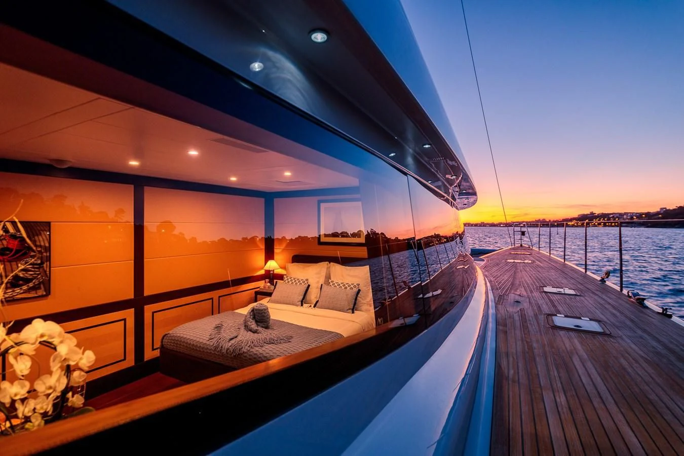 a large glass wall overlooking a body of water aboard ALLURES Yacht for Charter