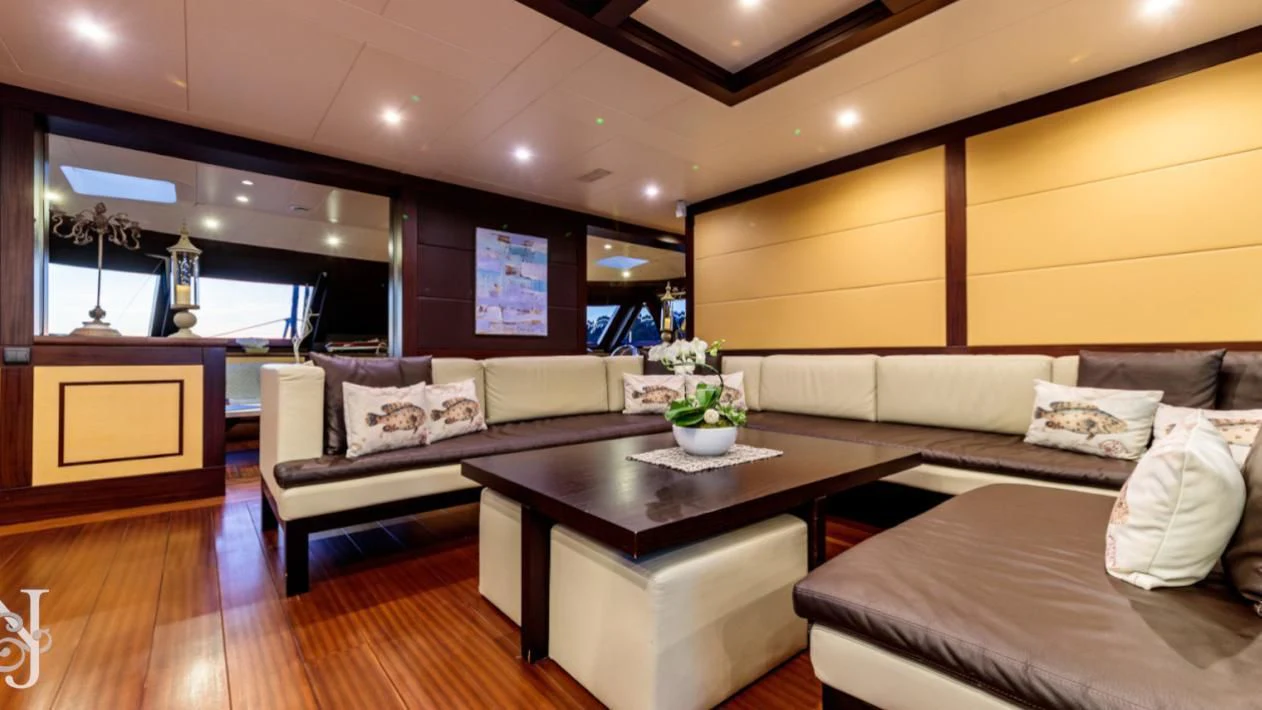 a modern looking living room aboard ALLURES Yacht for Charter