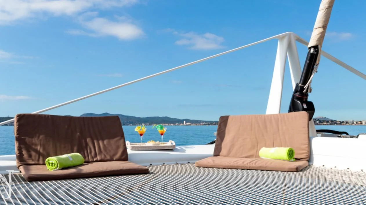 a hammock on a table aboard ALLURES Yacht for Charter