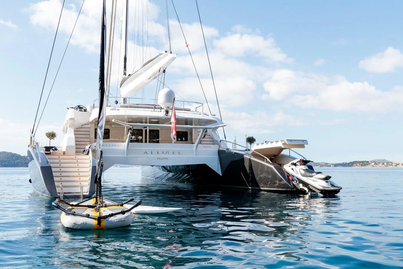 a boat on the water aboard ALLURES Yacht for Charter