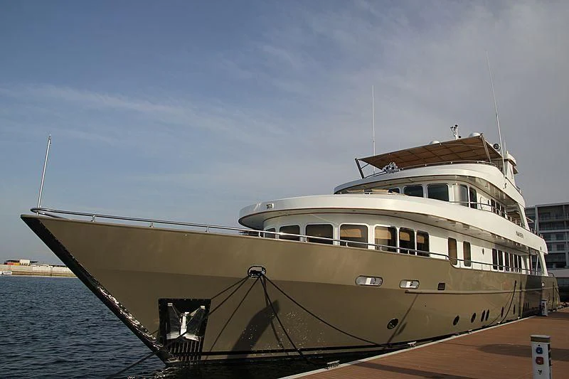 a large boat on the water aboard AMARA Yacht for Sale