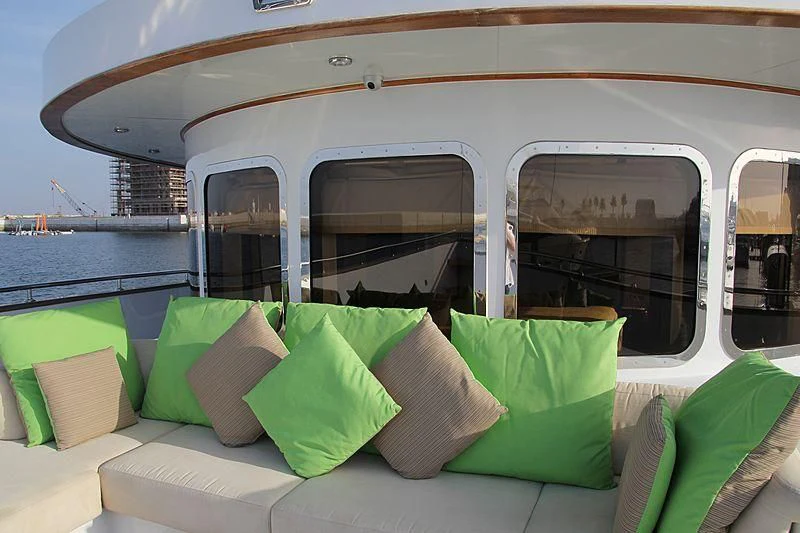 a couch on a boat aboard AMARA Yacht for Sale