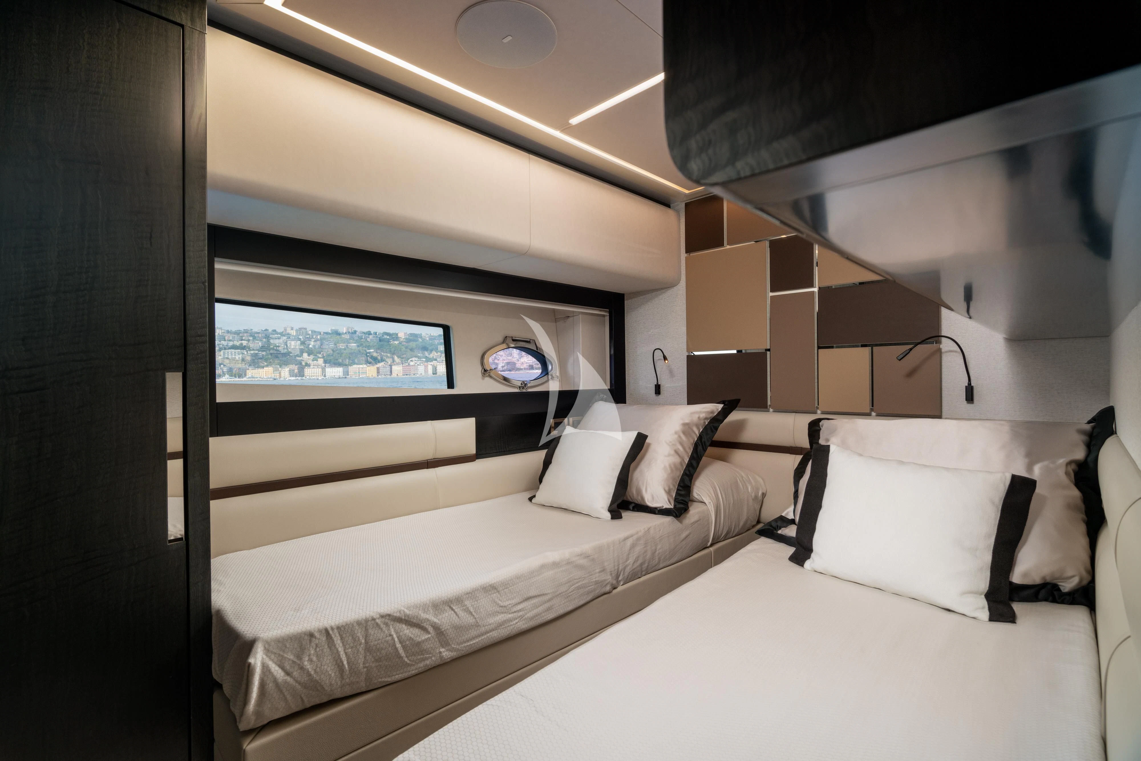 a room with a bed and a window aboard SOPHIA Yacht for Sale