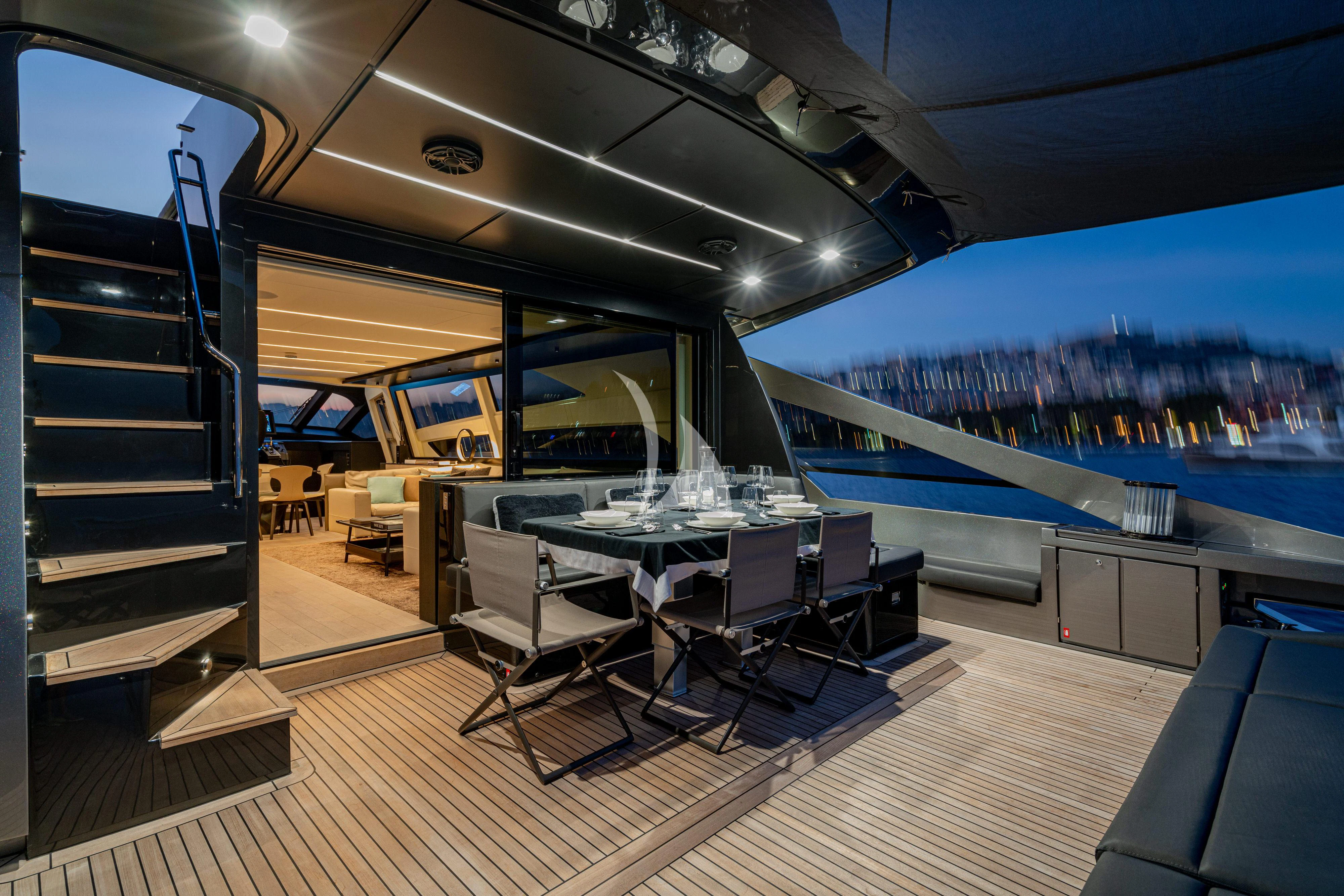 a room with a view of the city and the ocean aboard SOPHIA Yacht for Sale
