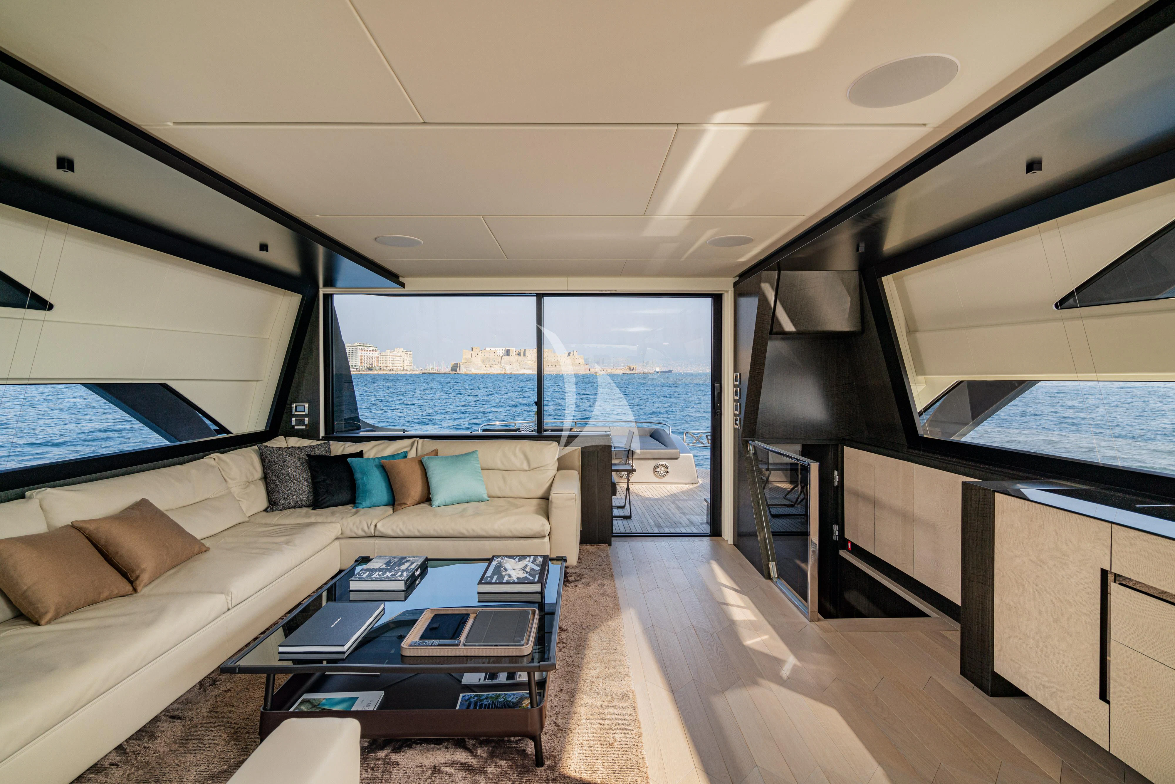 a living room with a large window aboard SOPHIA Yacht for Sale