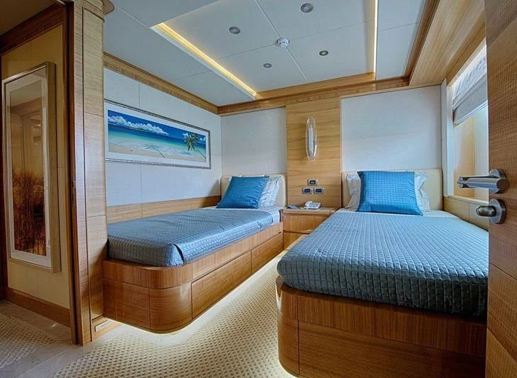 a room with two beds aboard UAQ 1 Yacht for Sale