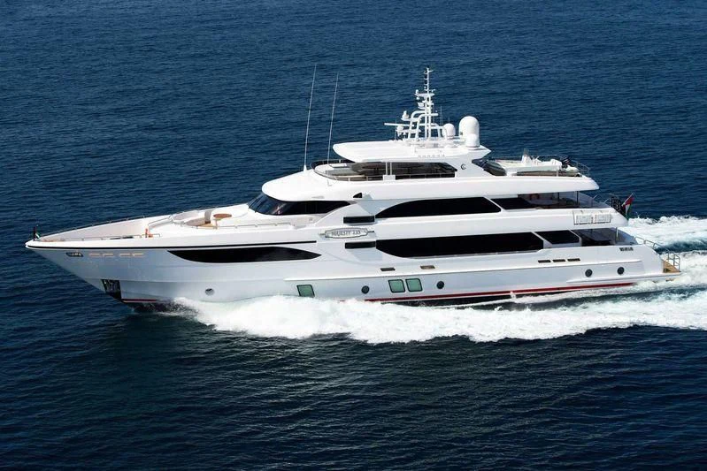 a white yacht on the water aboard UAQ 1 Yacht for Sale